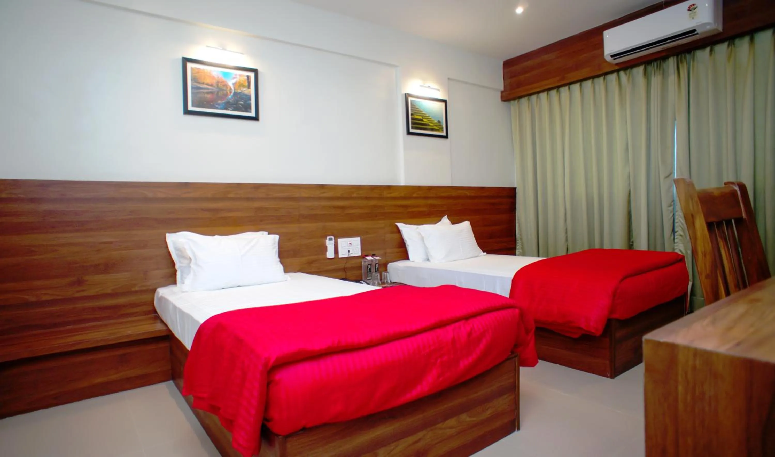 Bedroom, Bed in Mastiff Hotel Chinchwad by OTHPL