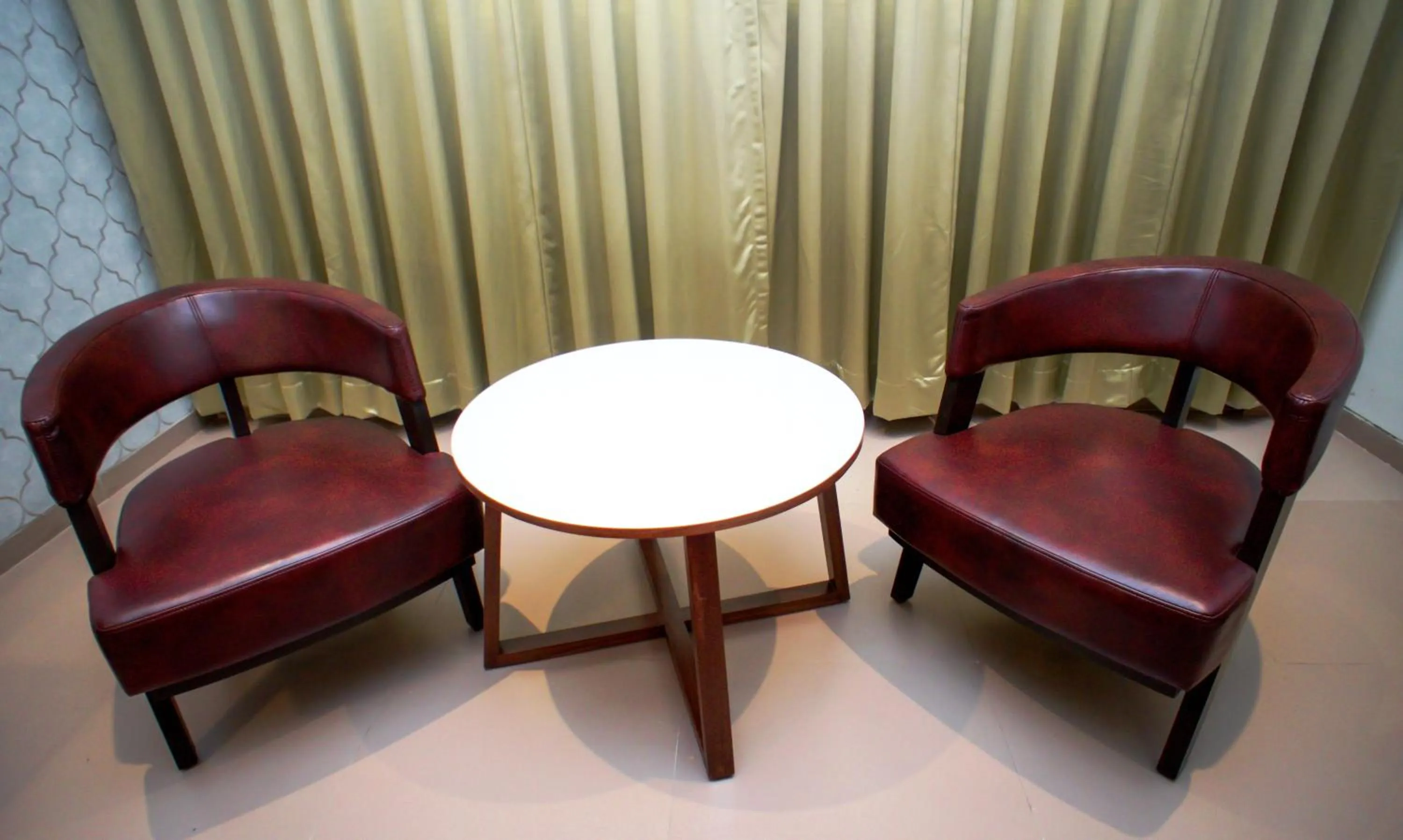 Seating area in Mastiff Hotel Chinchwad by OTHPL