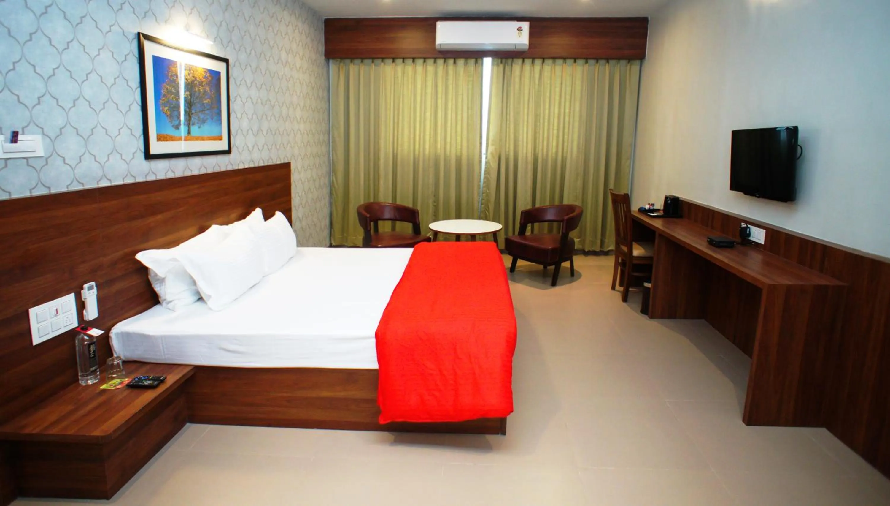 Bedroom, Bed in Mastiff Hotel Chinchwad by OTHPL