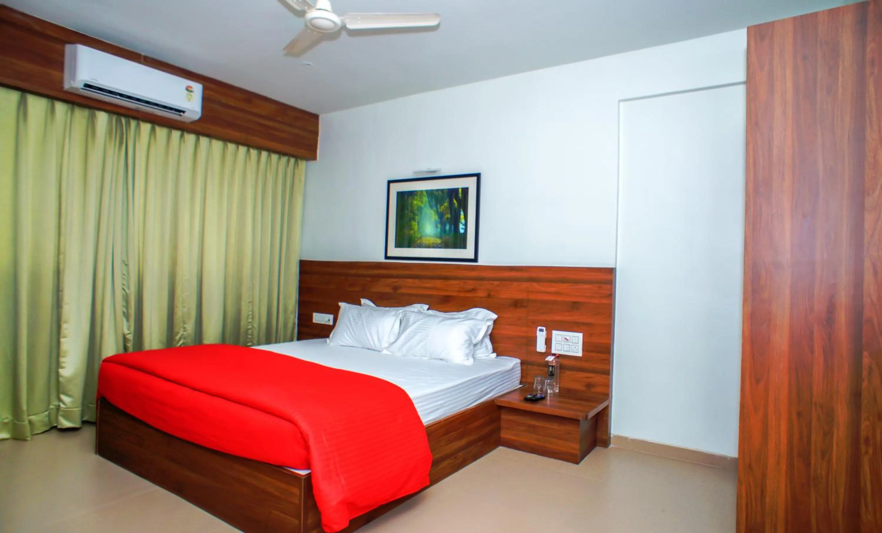 Bedroom, Bed in Mastiff Hotel Chinchwad by OTHPL