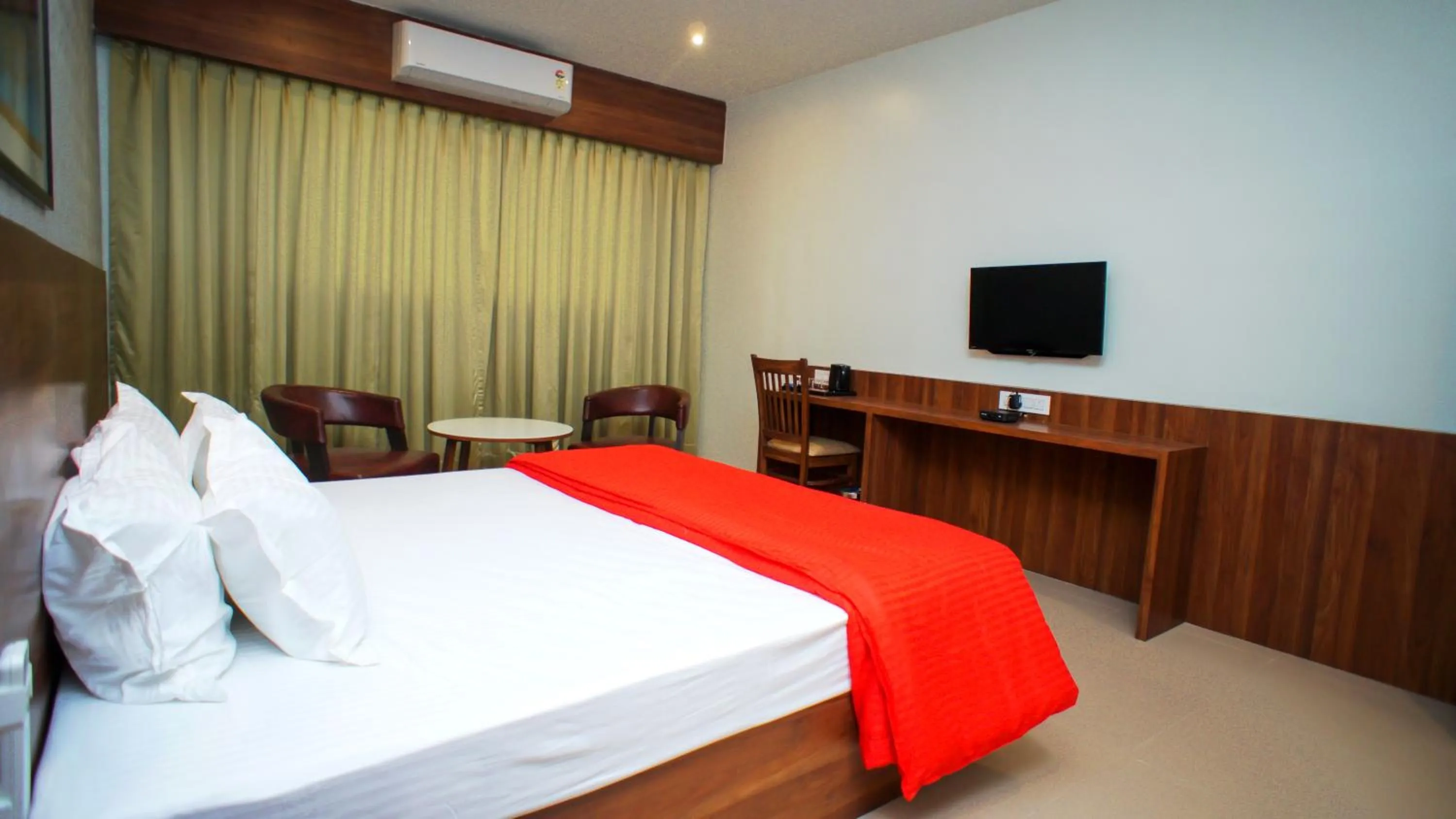 Bedroom, Bed in Mastiff Hotel Chinchwad by OTHPL