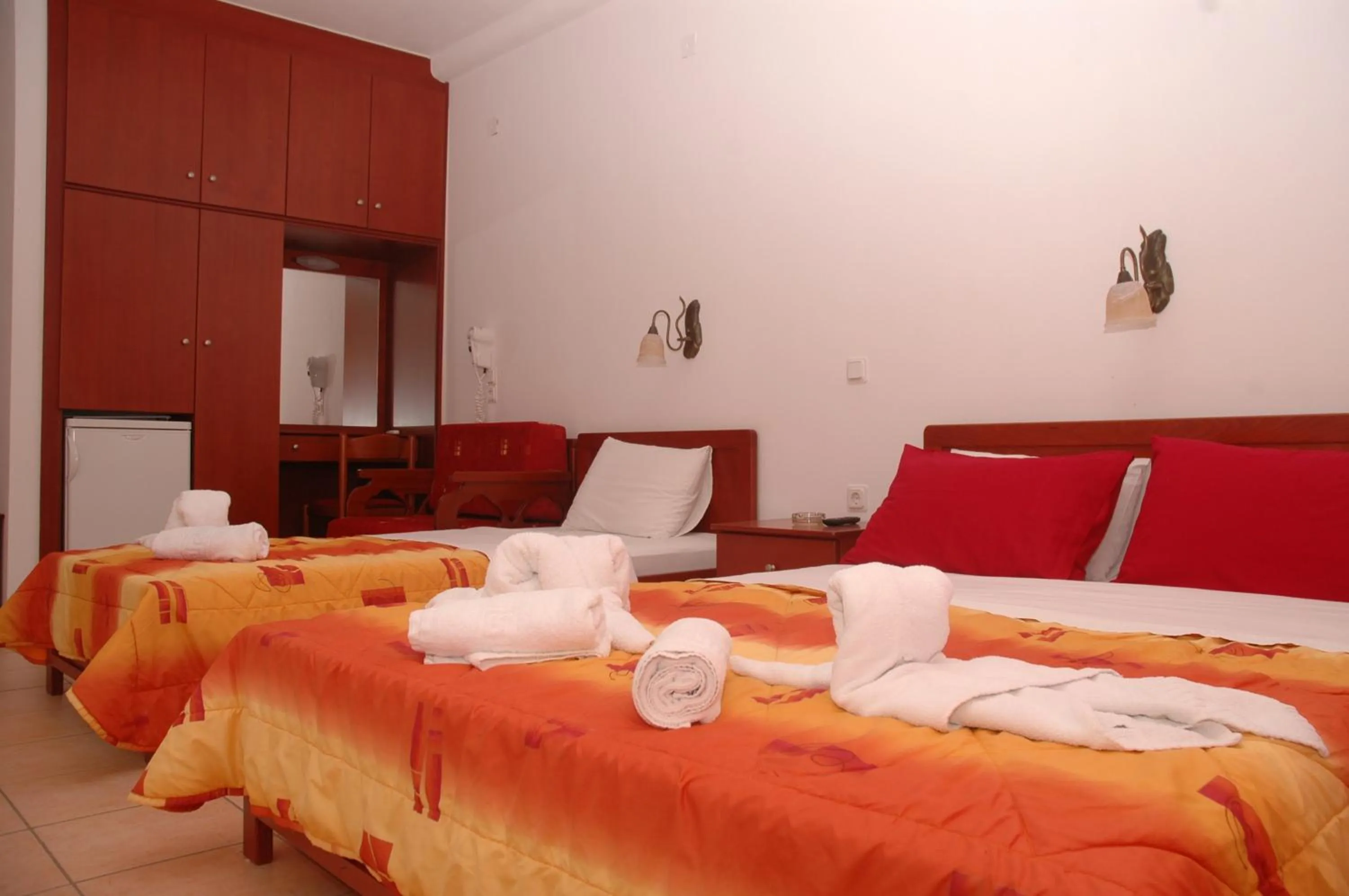 Bed in Agnanti Hotel