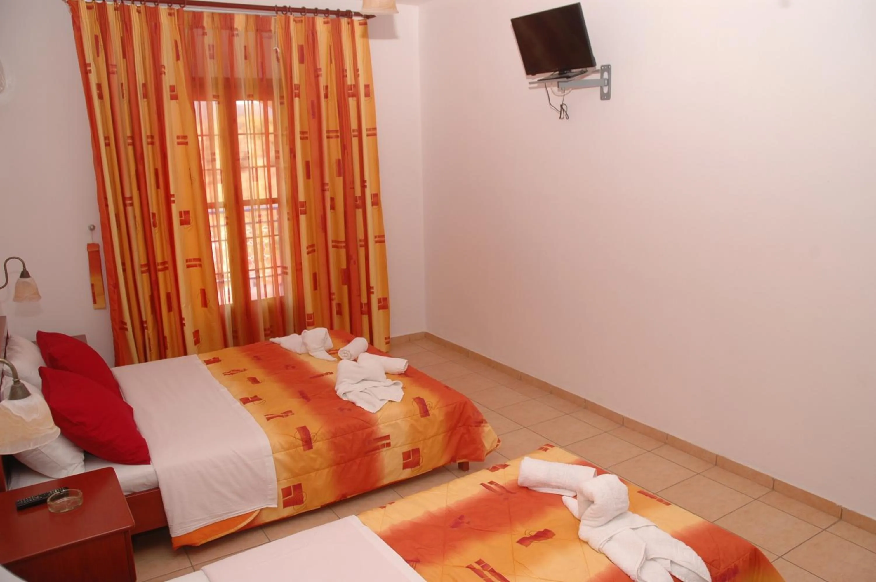 Bed in Agnanti Hotel