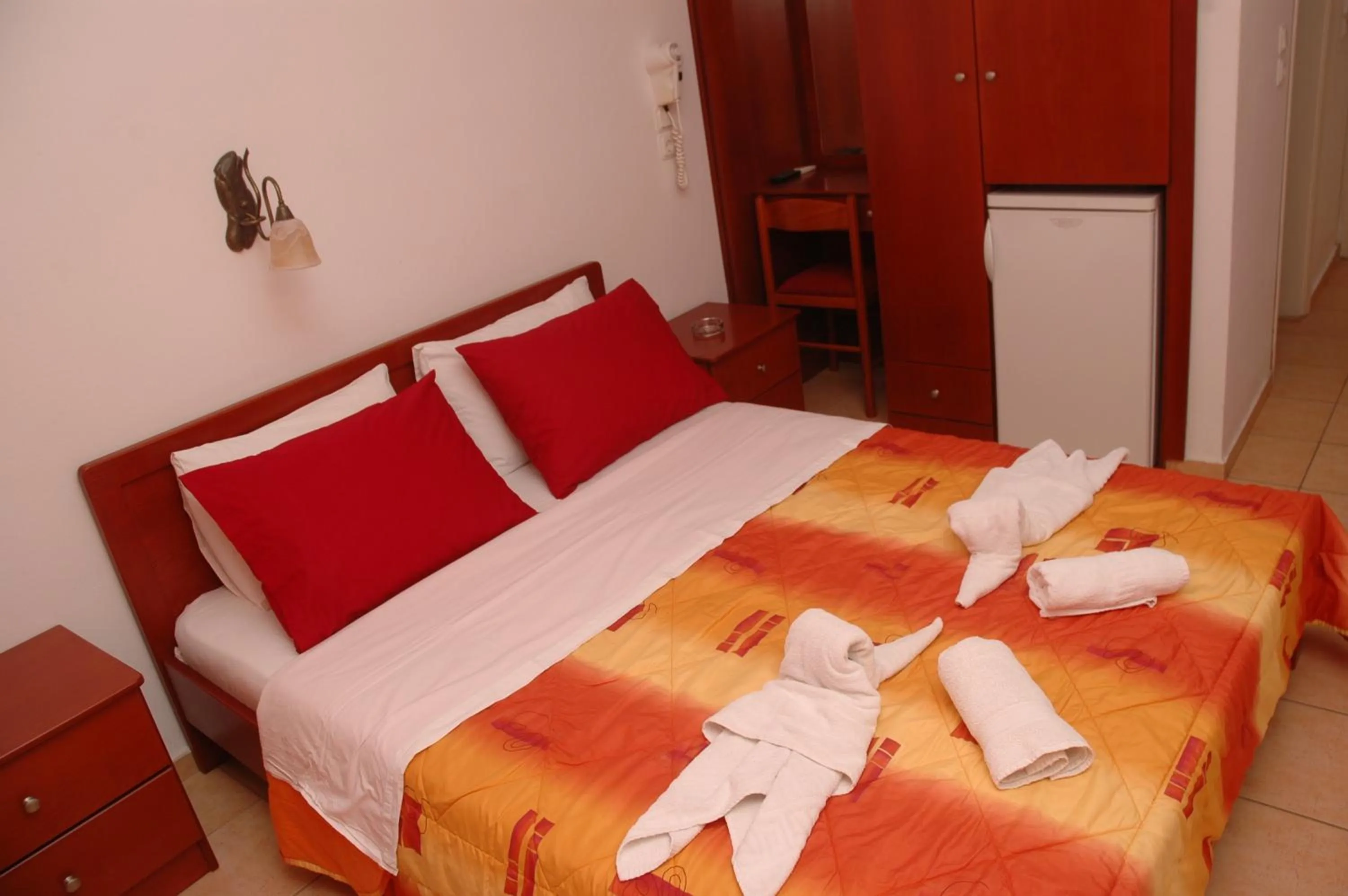 Bed in Agnanti Hotel