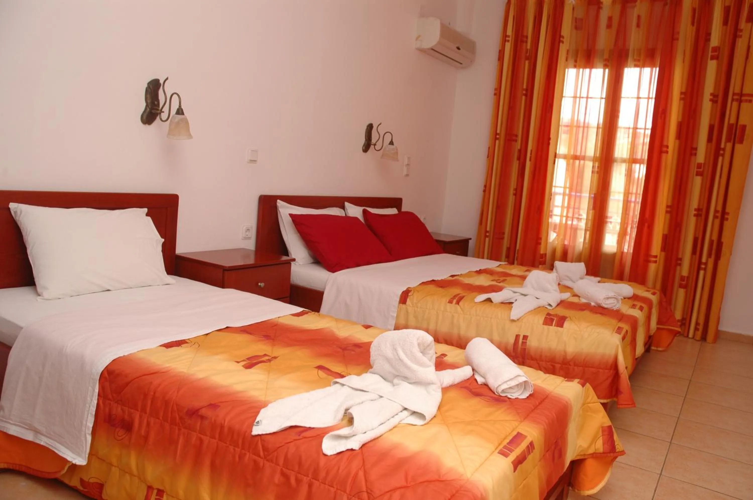 Bed in Agnanti Hotel