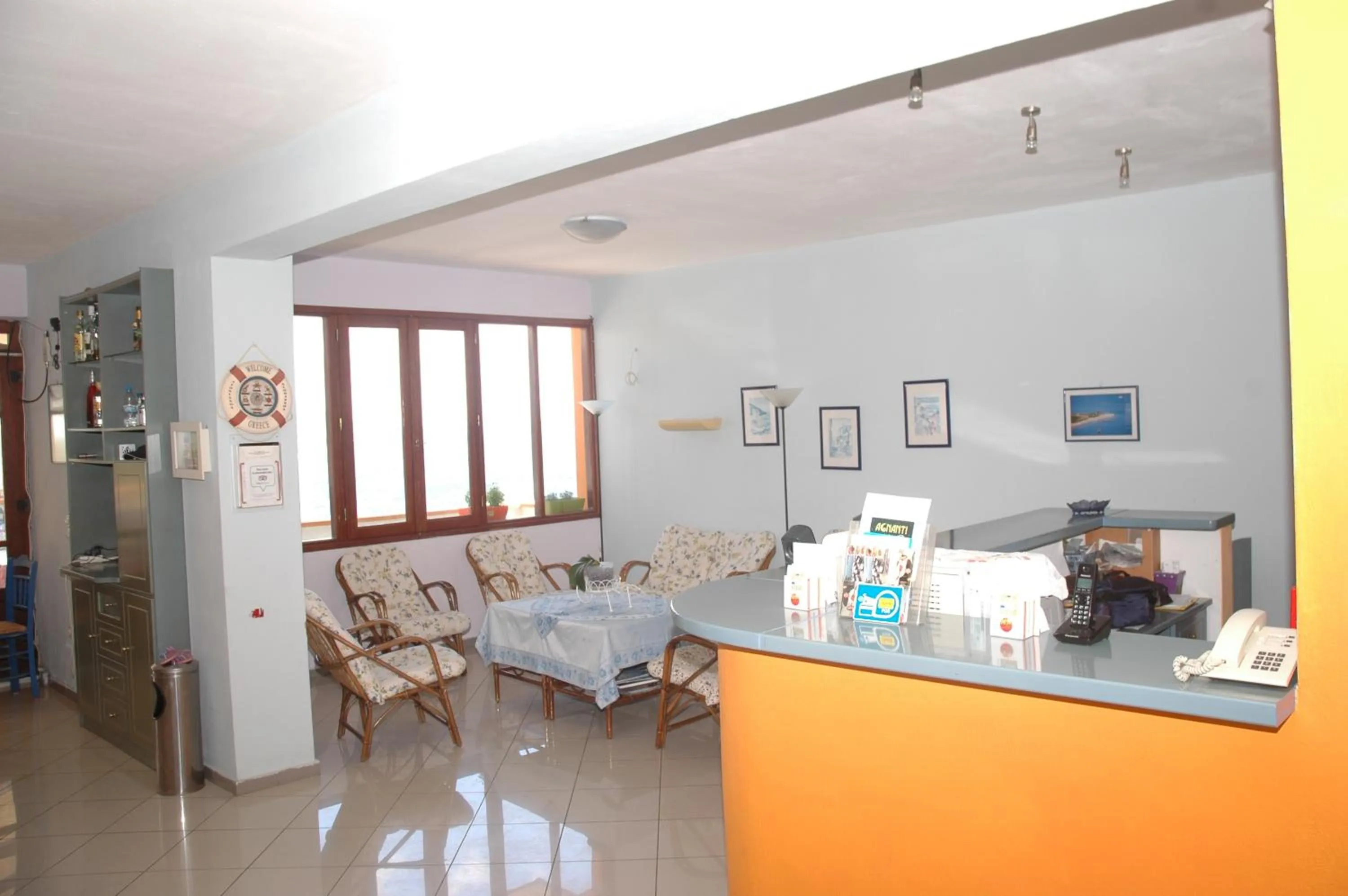 Communal lounge/ TV room in Agnanti Hotel