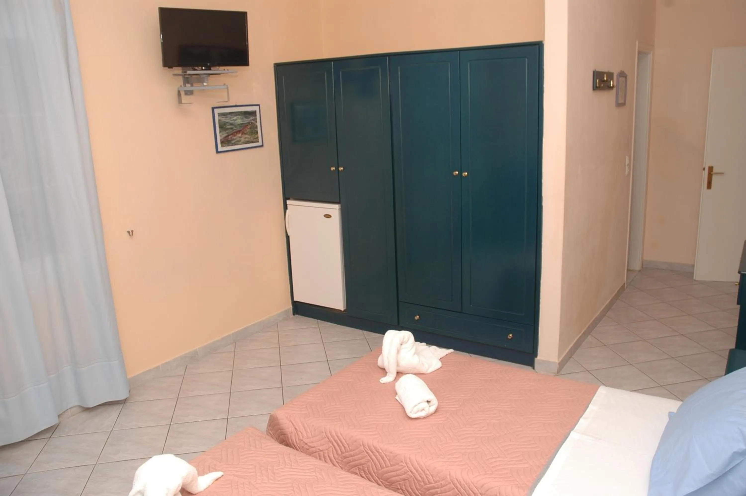 TV and multimedia, Bed in Agnanti Hotel