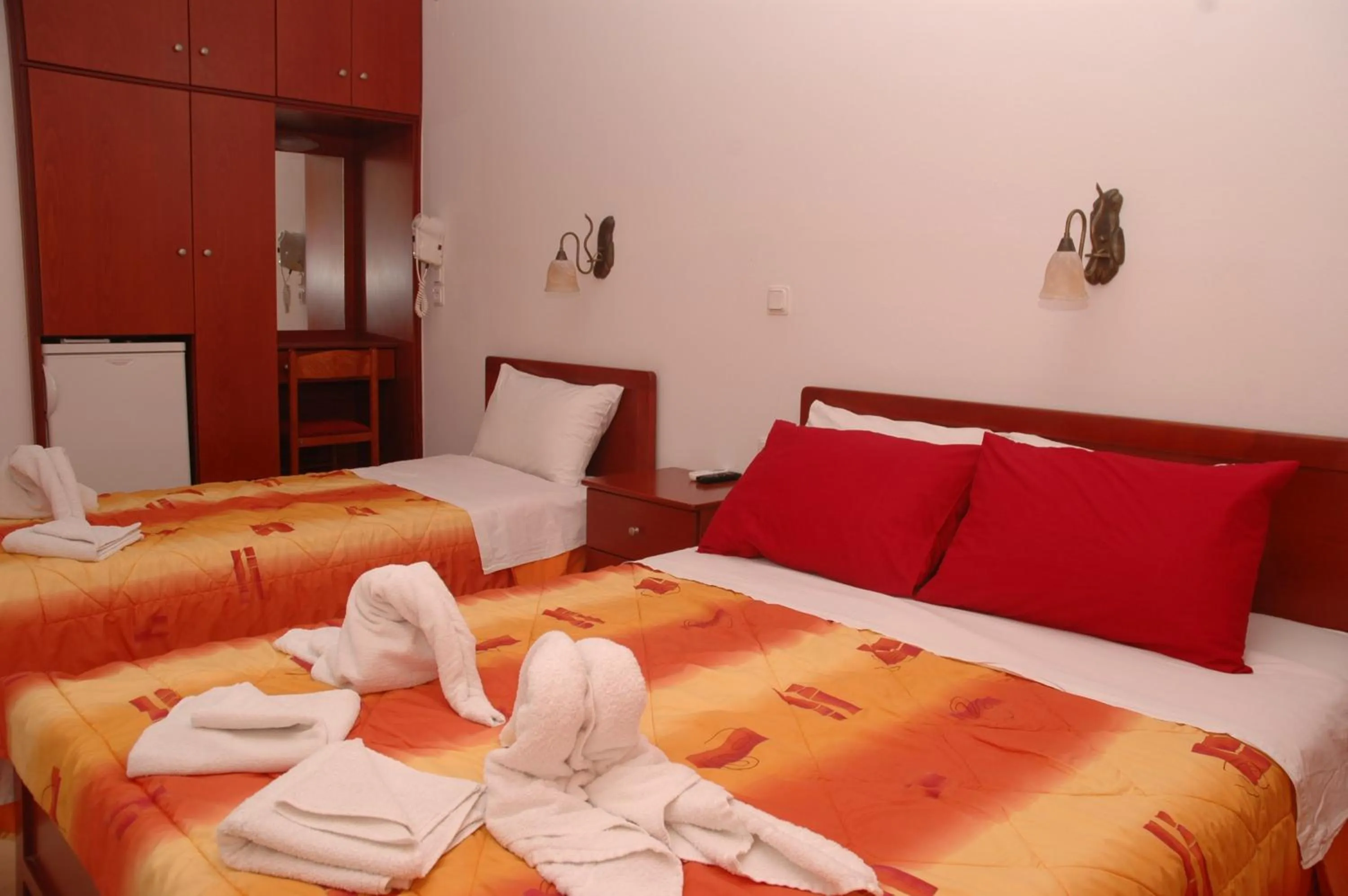 Bed in Agnanti Hotel