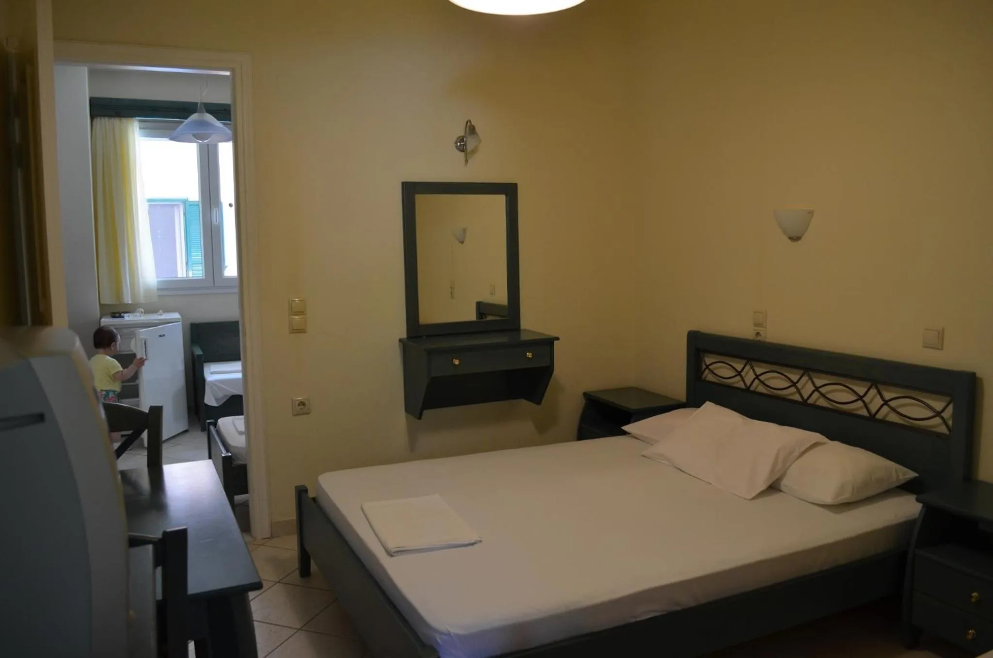 Bed in Odysseia Apartments