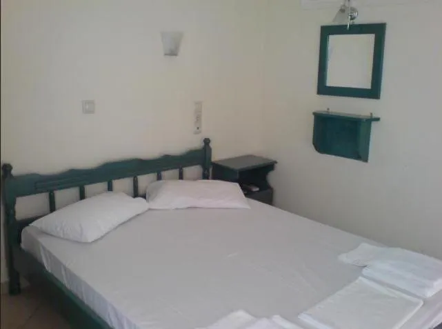 Bed in Odysseia Apartments