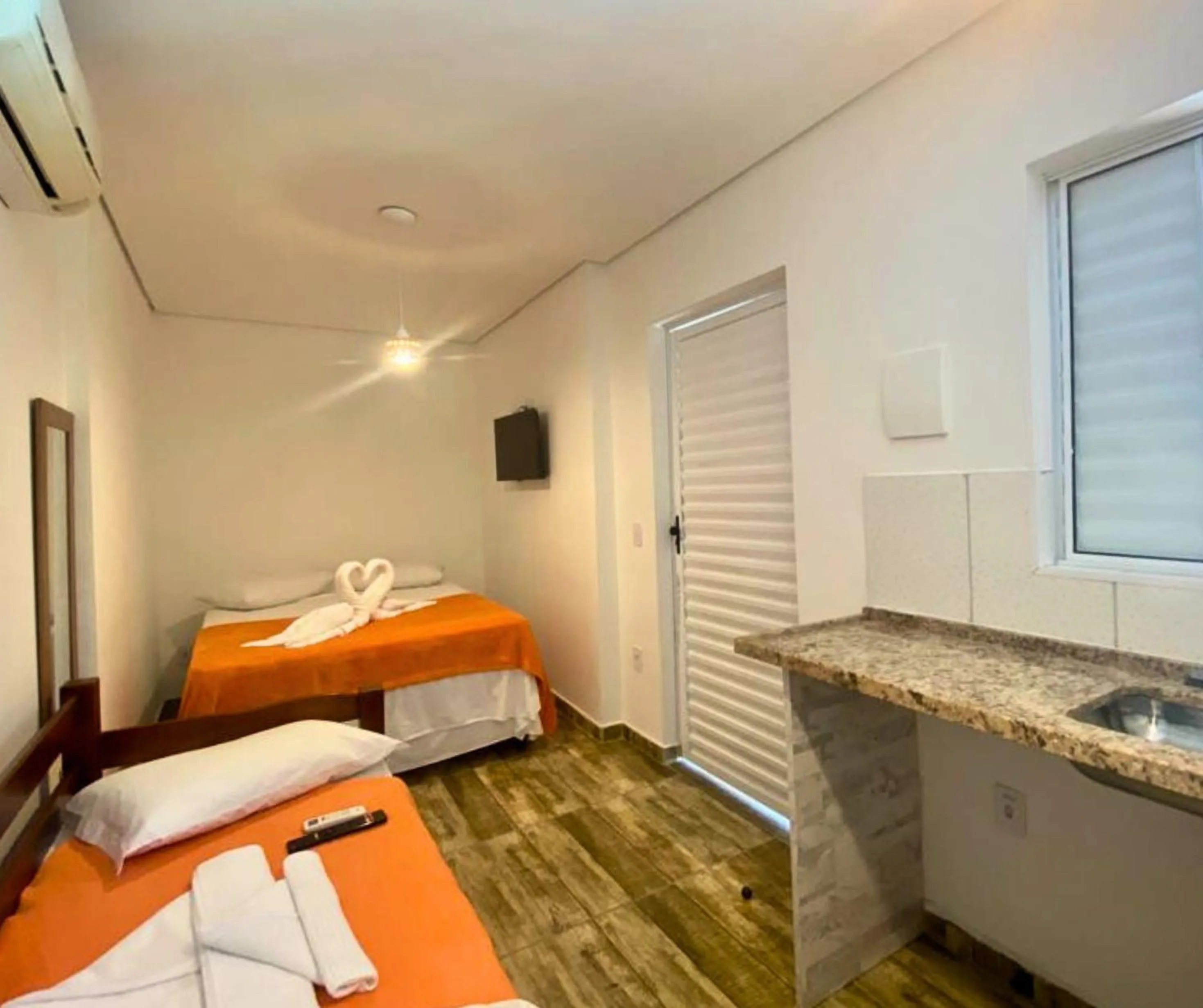 Bed in Pousada Papaya Container