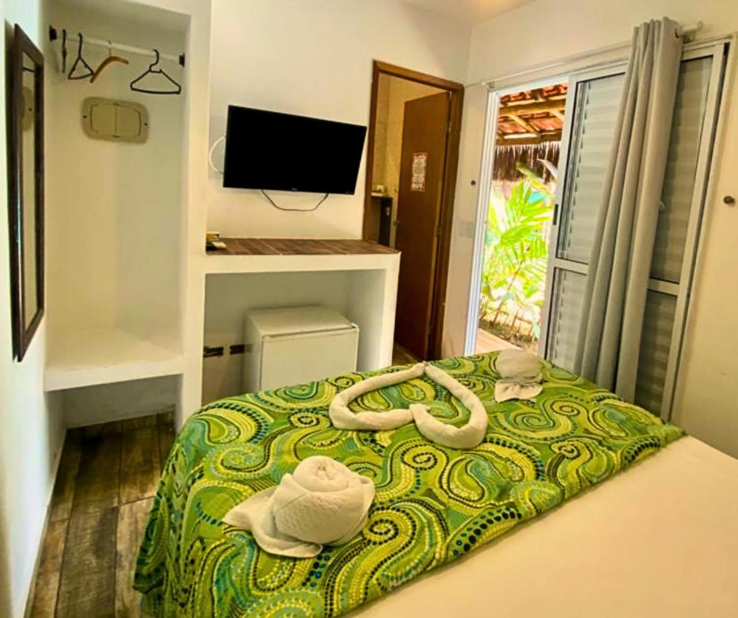 Bed in Pousada Papaya Container