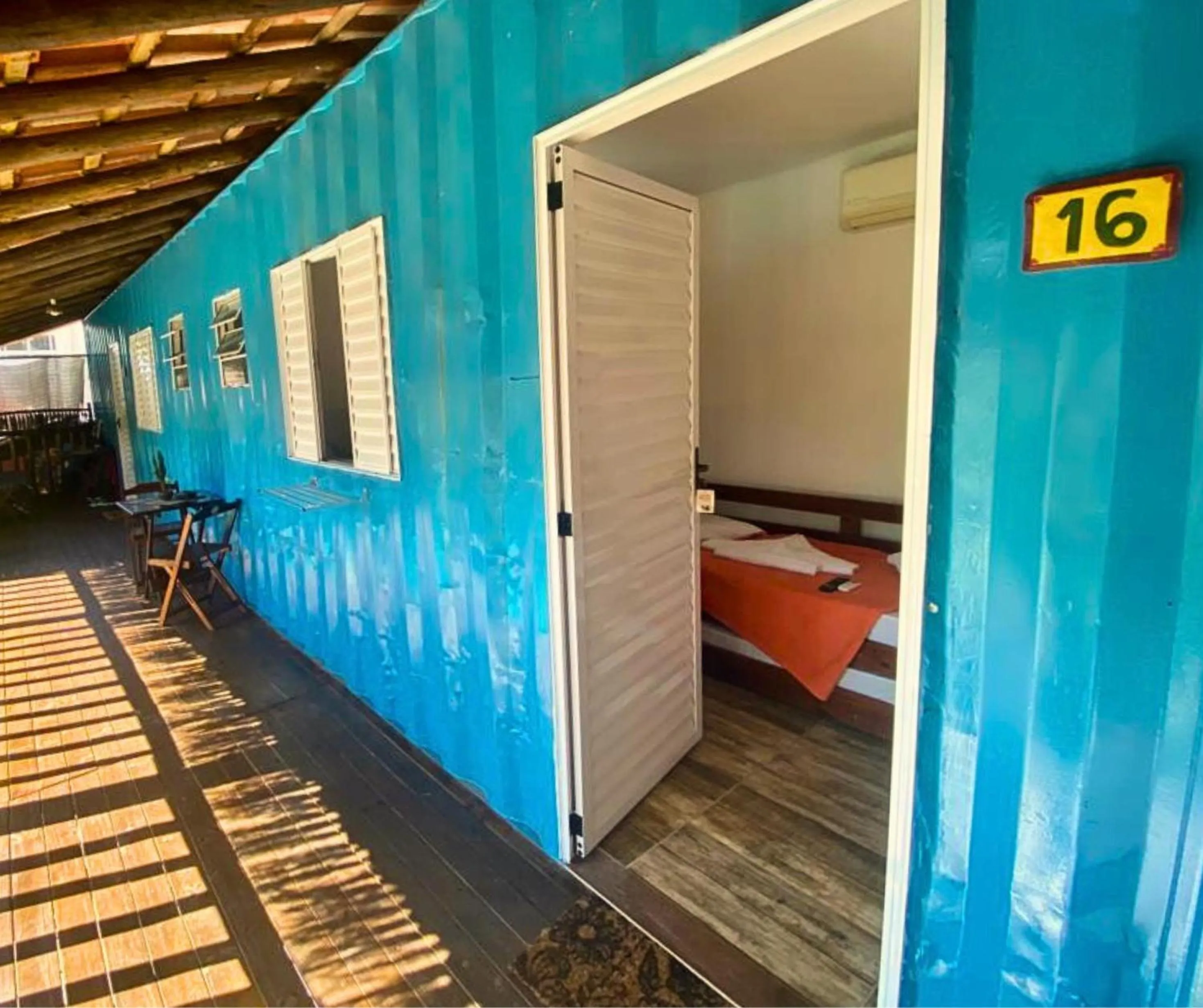 Bed in Pousada Papaya Container