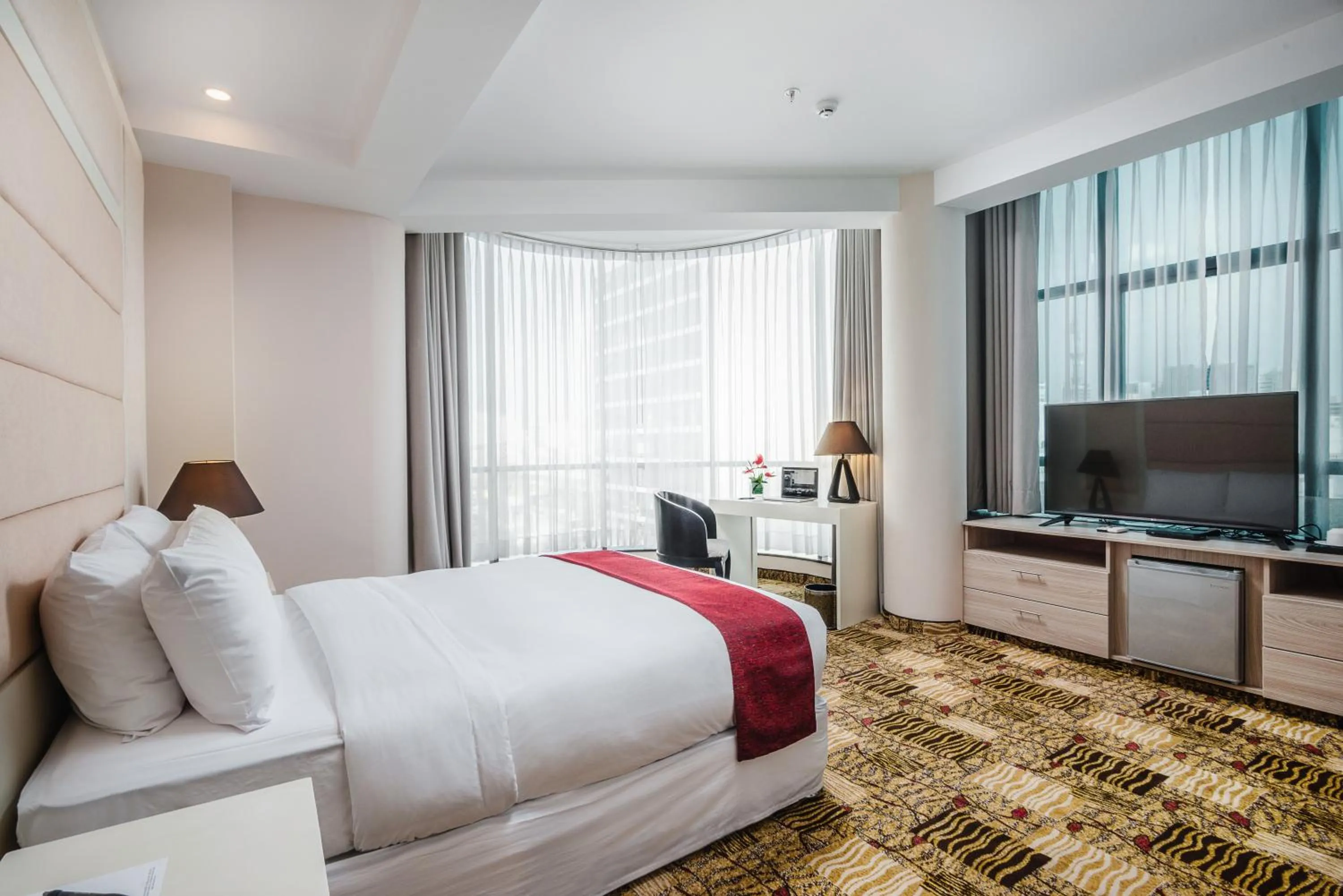 Bed in Nobility Grand Hotel