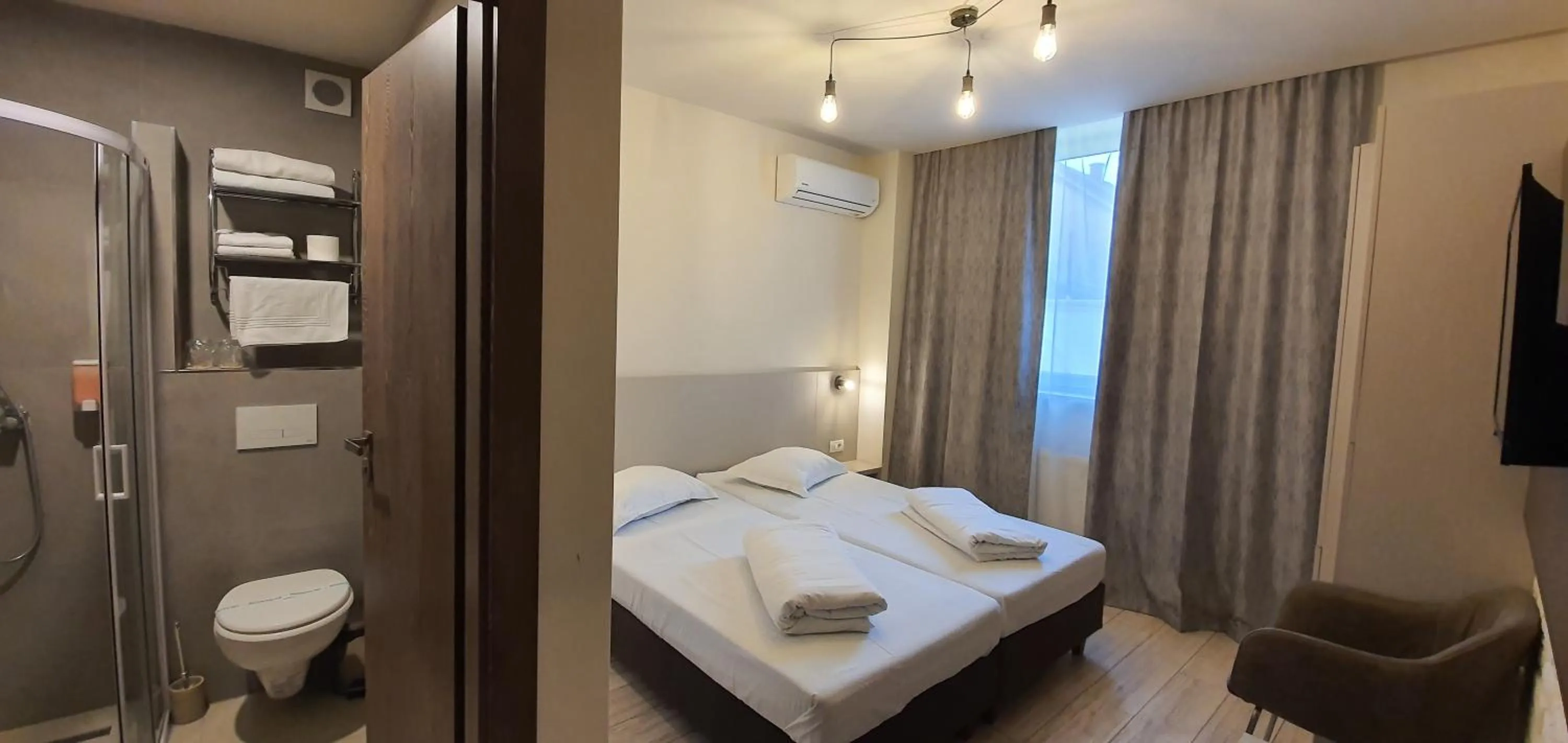 Photo of the whole room, Bed in XO Residence