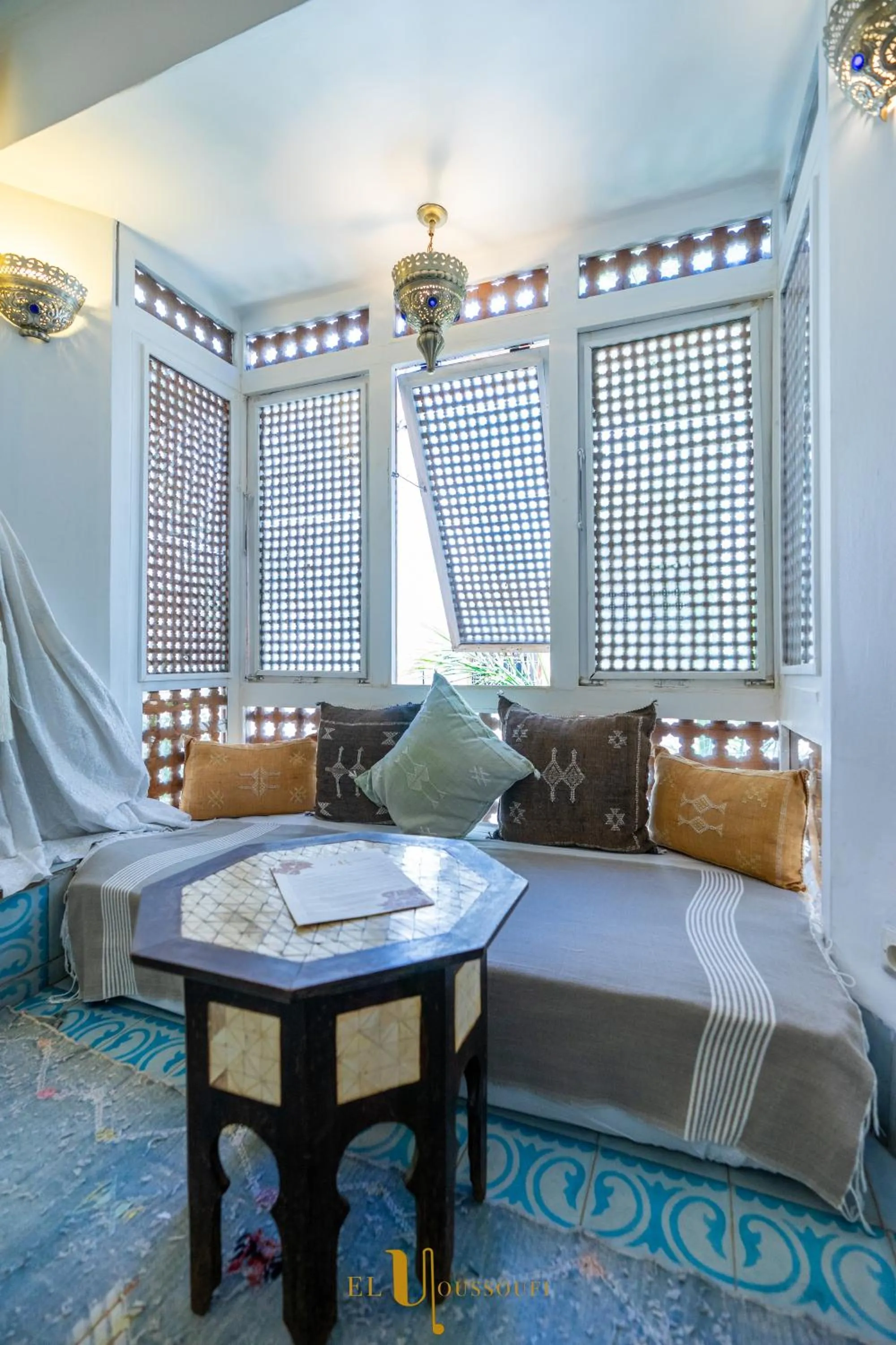 Seating area, Bed in Riad El Youssoufi