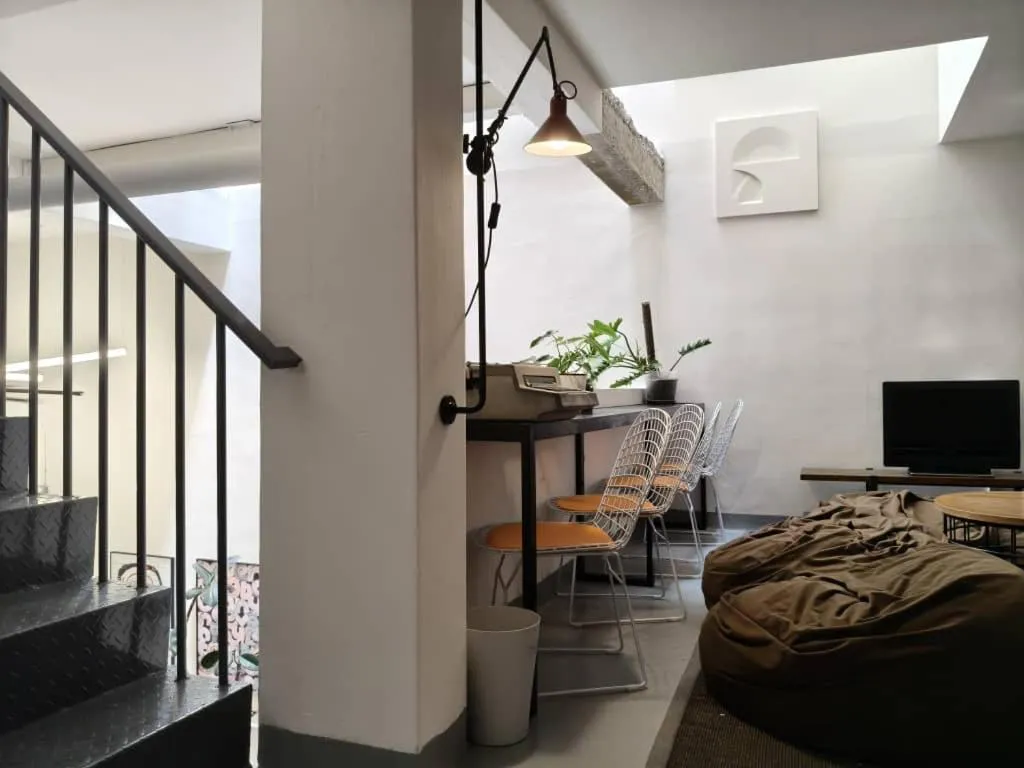 Seating area, Bed in The Brownstone Hostel &amp; Space