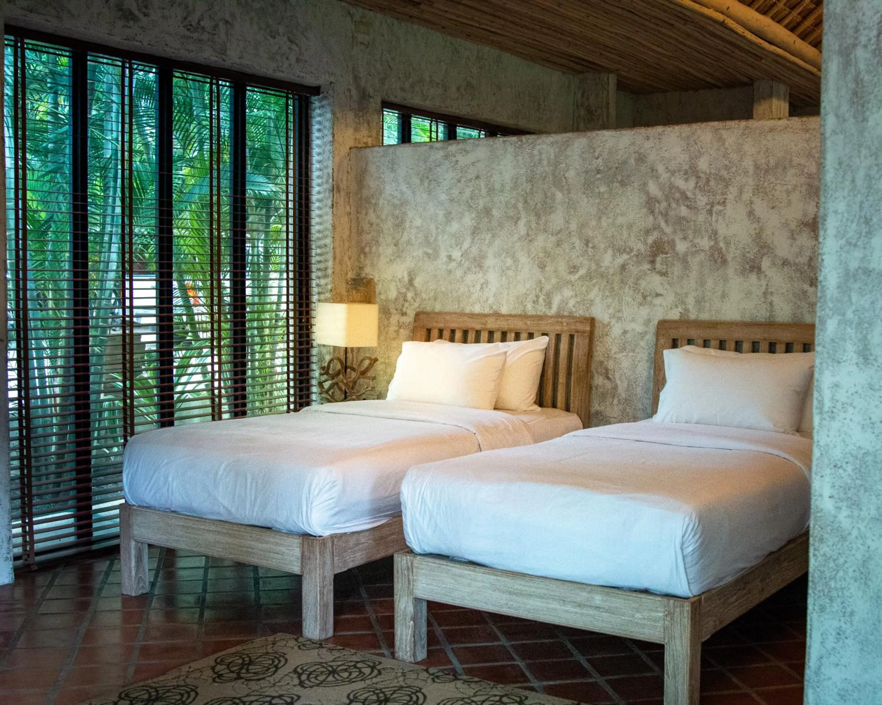 Bed in Baanpong Lodge