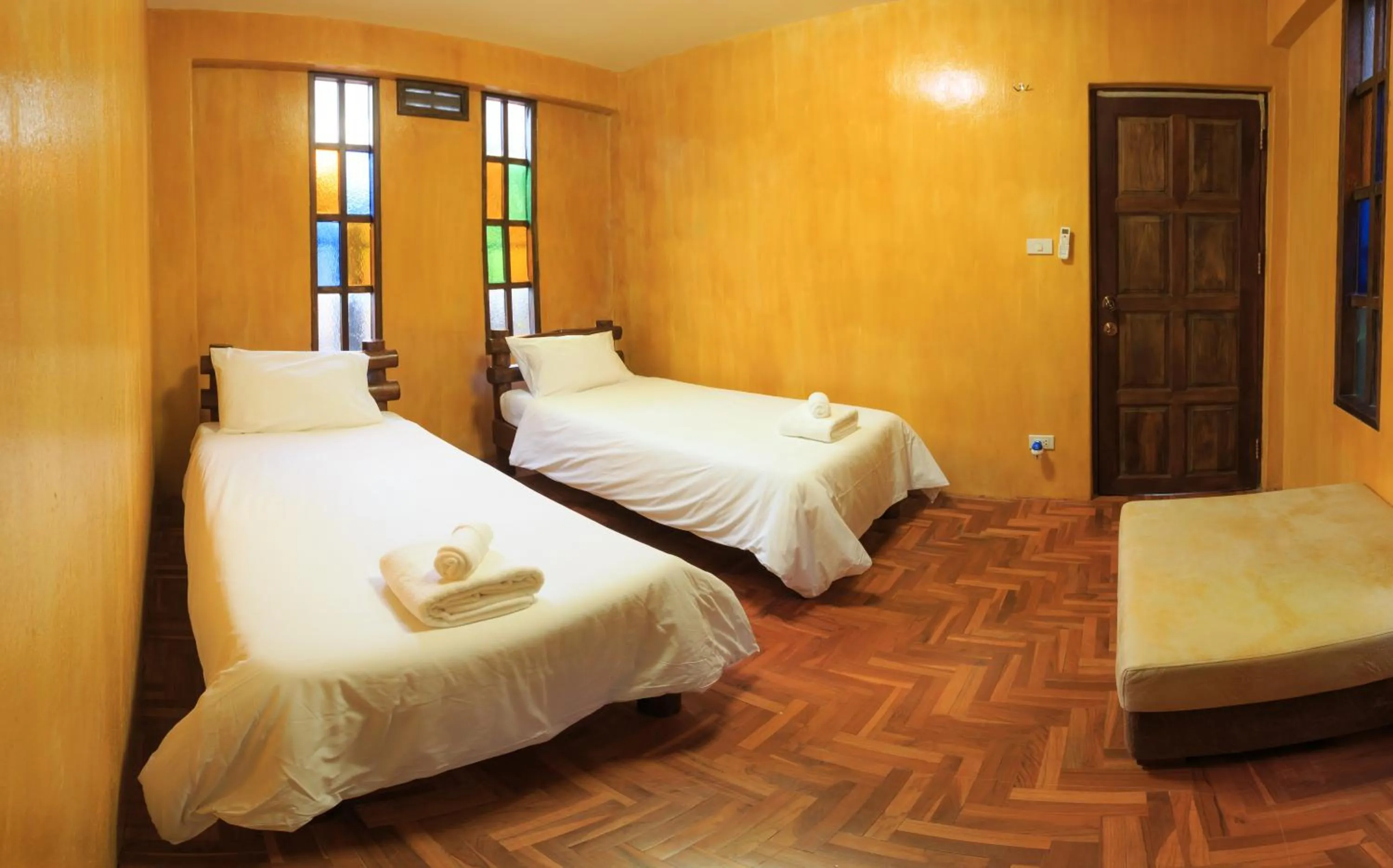 Bed in Baanpong Lodge