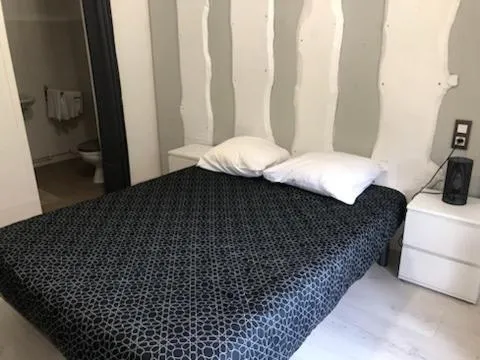 Bed in HOTEL BON ACCUEIL