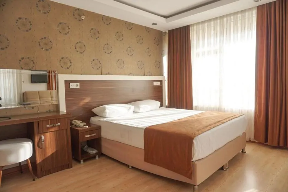 Photo of the whole room, Bed in River Hotel