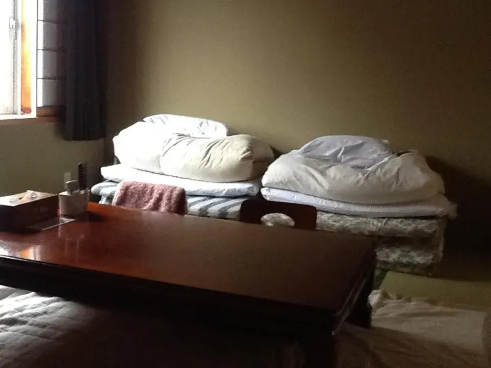 Dining area, Bed in Asahi City Inn Hotel