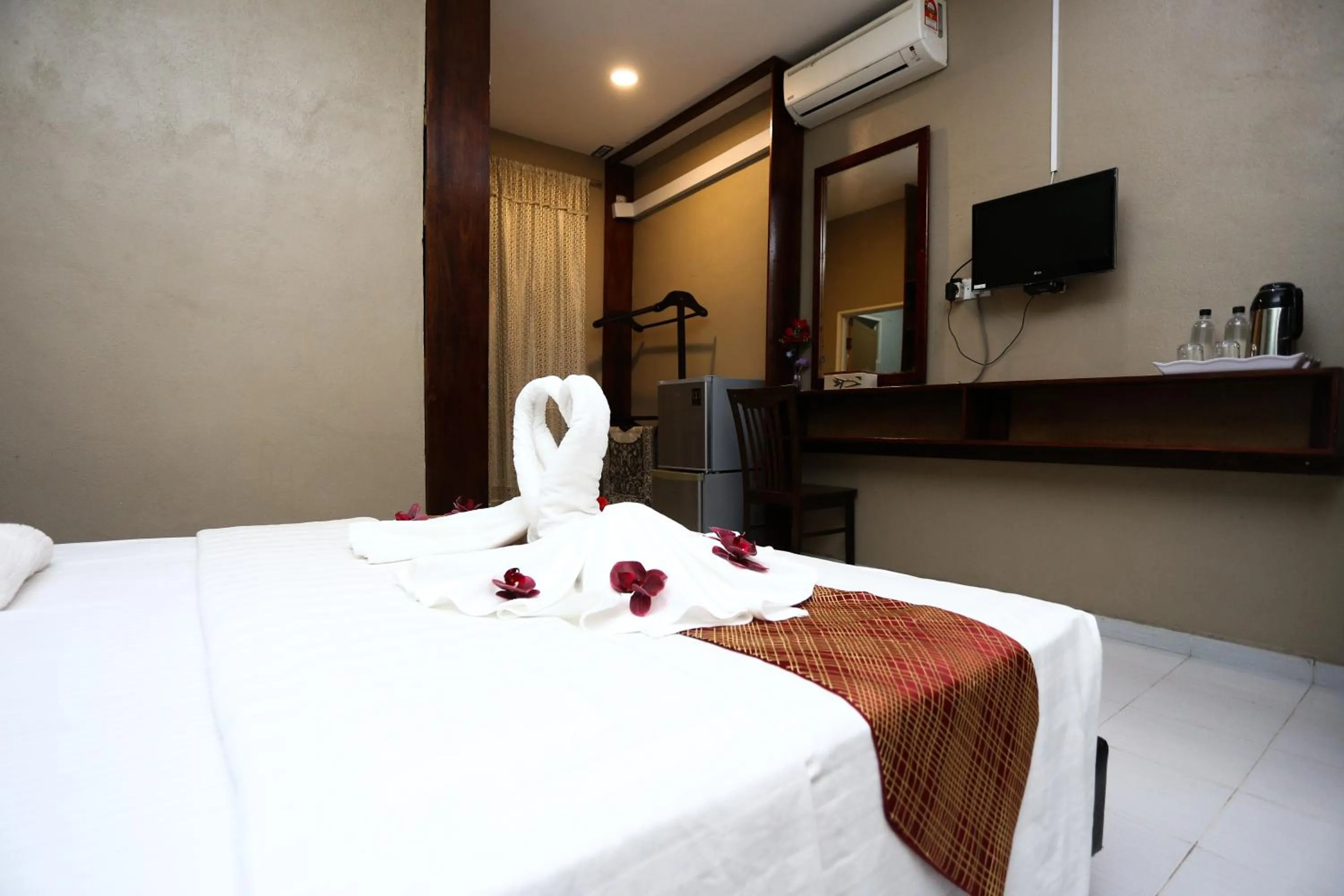 Bed in Pondok Muara Chalet