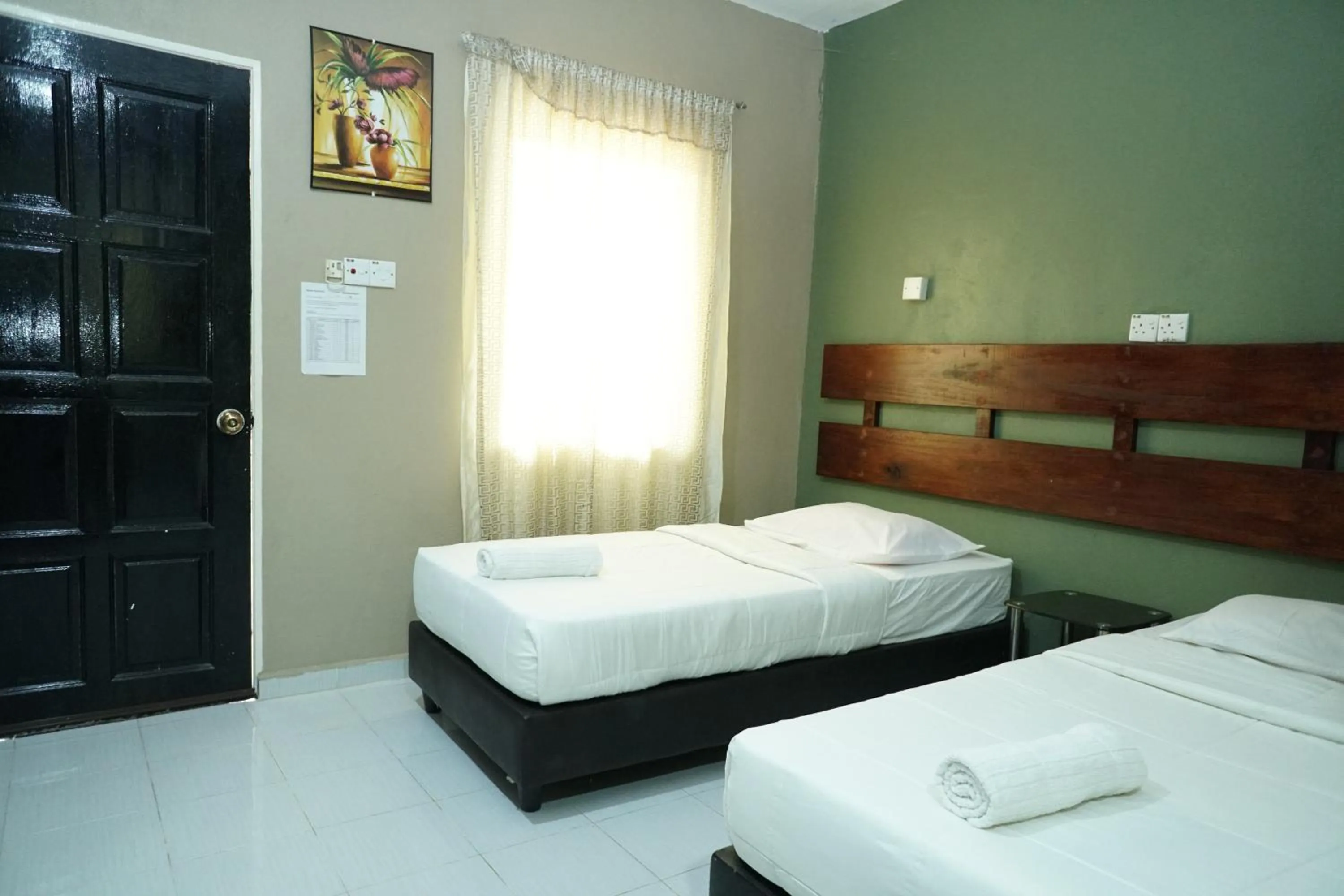 Bed in Pondok Muara Chalet