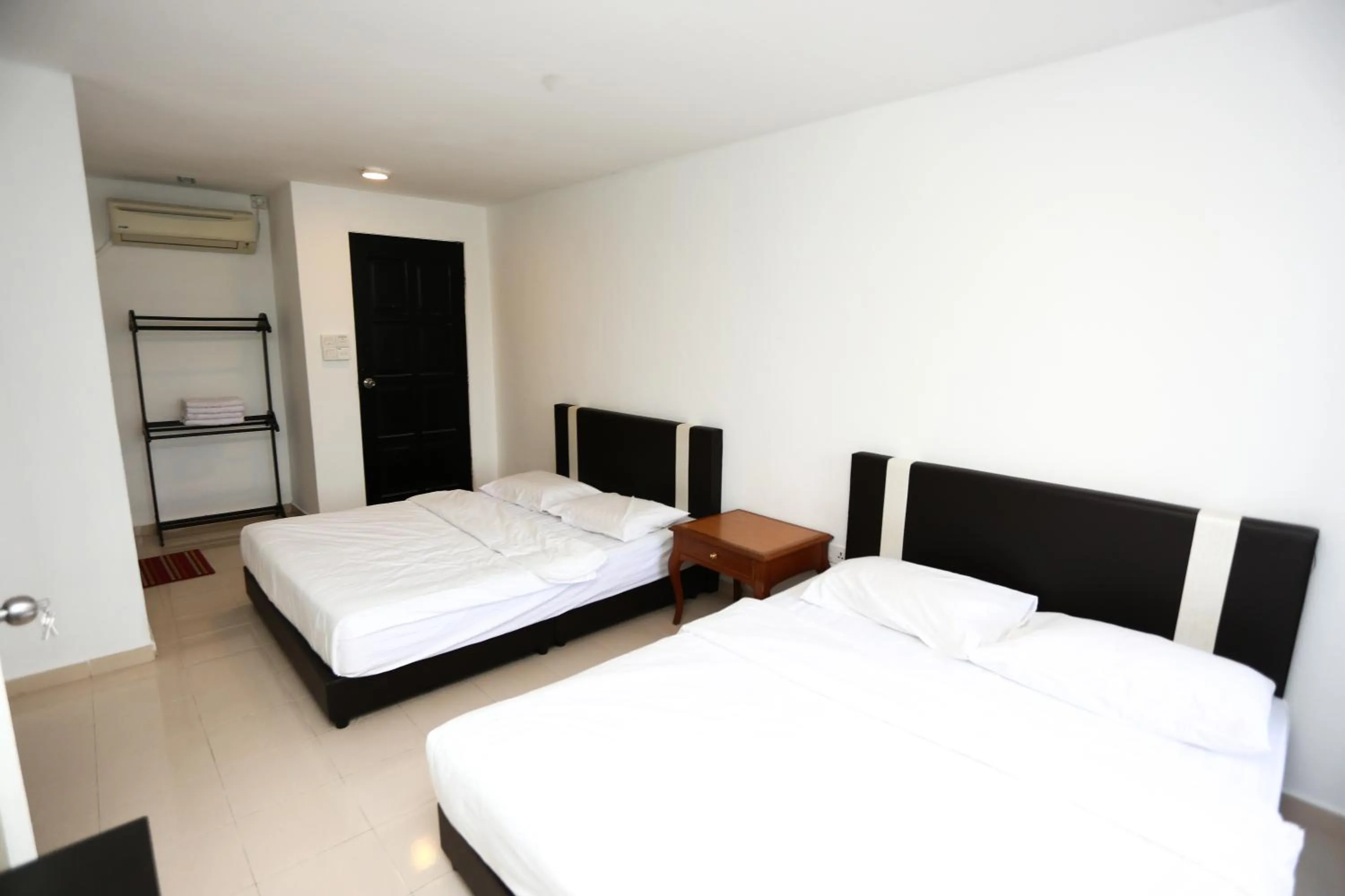 Bed in Pondok Muara Chalet