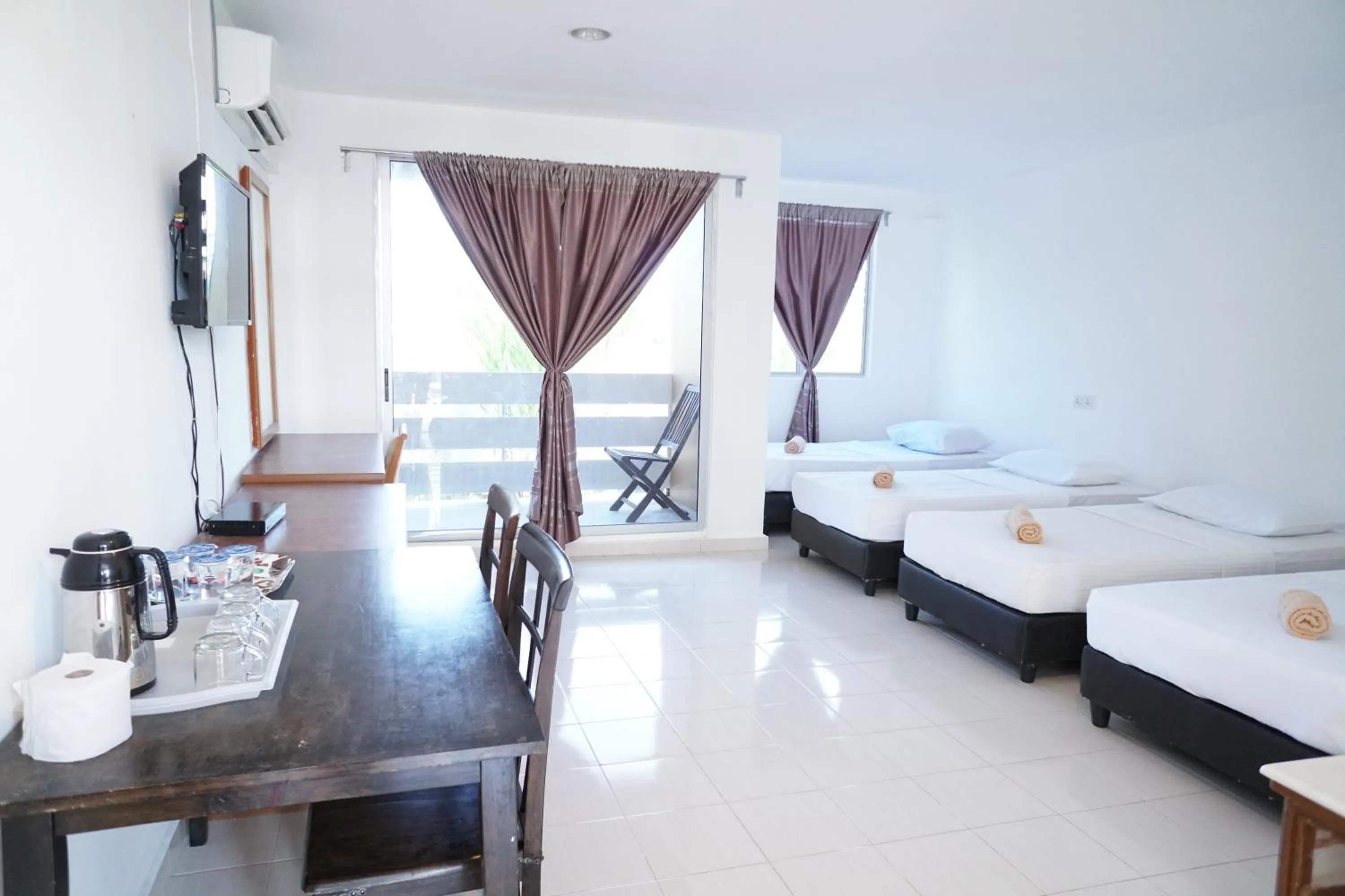 Bed in Pondok Muara Chalet