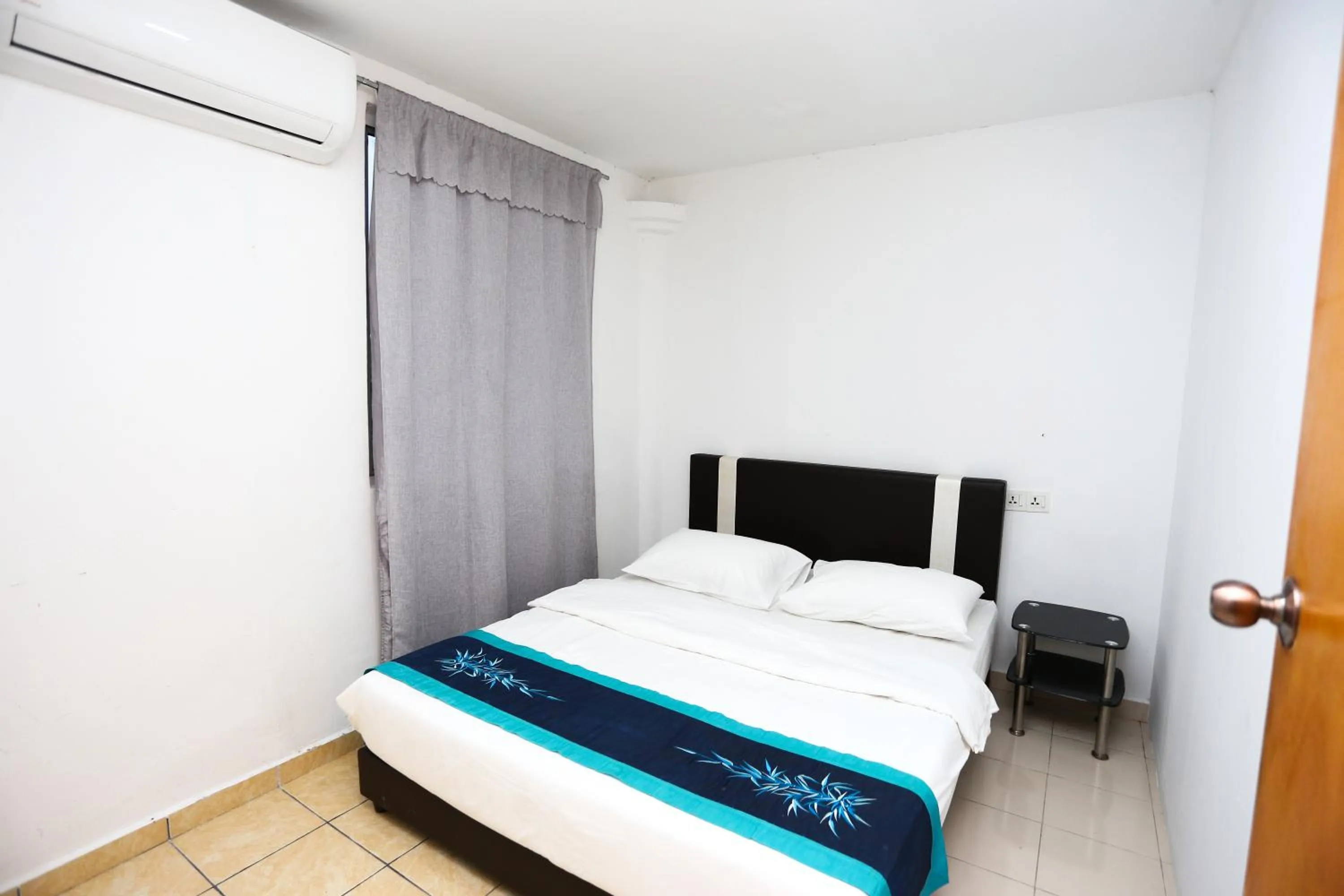 Bed in Pondok Muara Chalet