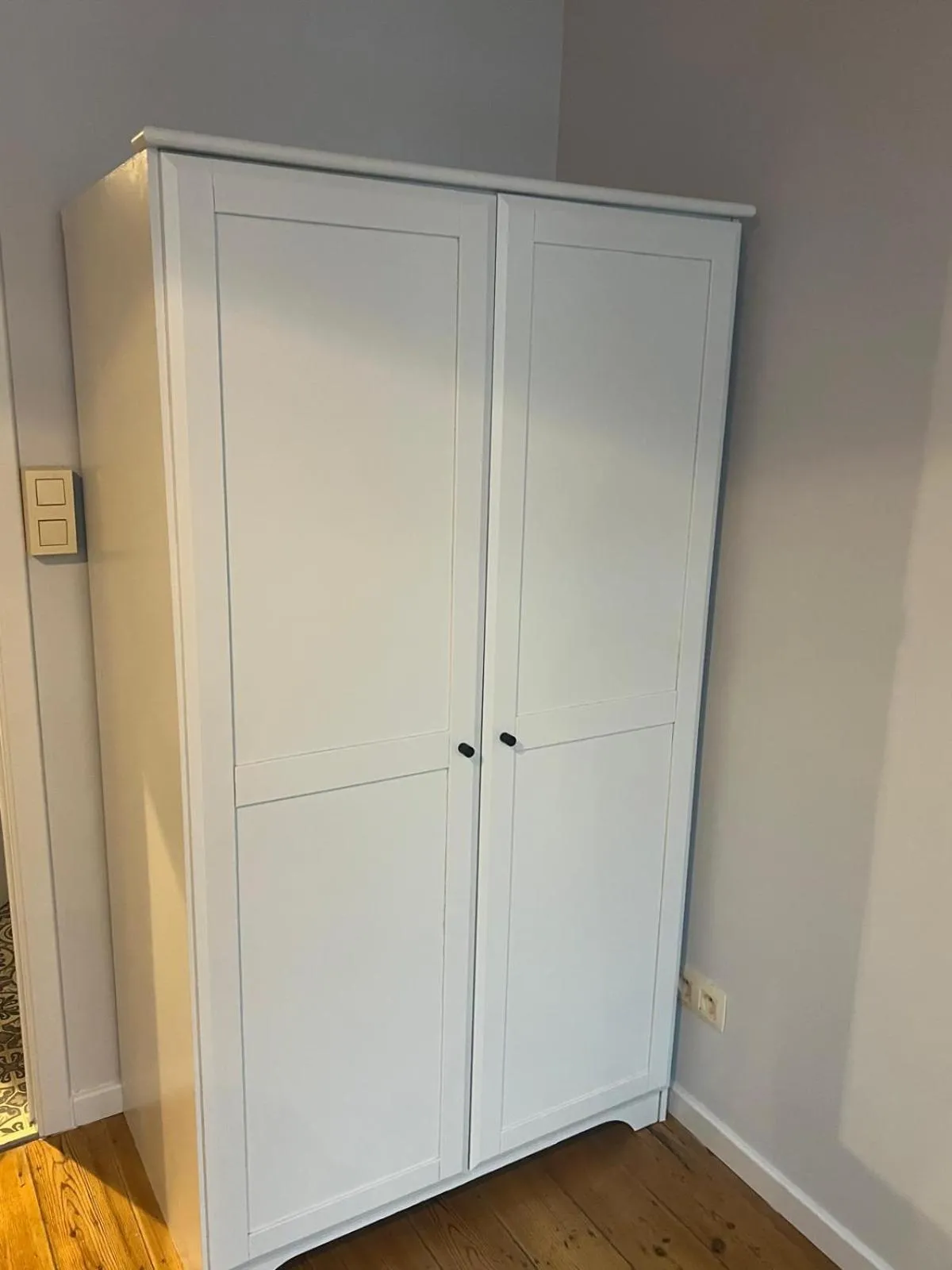 wardrobe in Because the Night city lodge