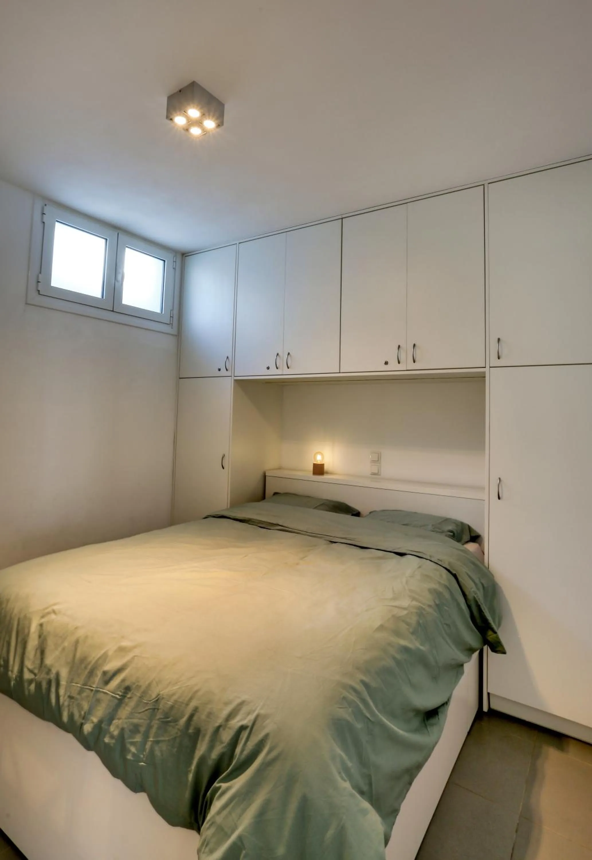 Bed in Helios Studios & Apartments