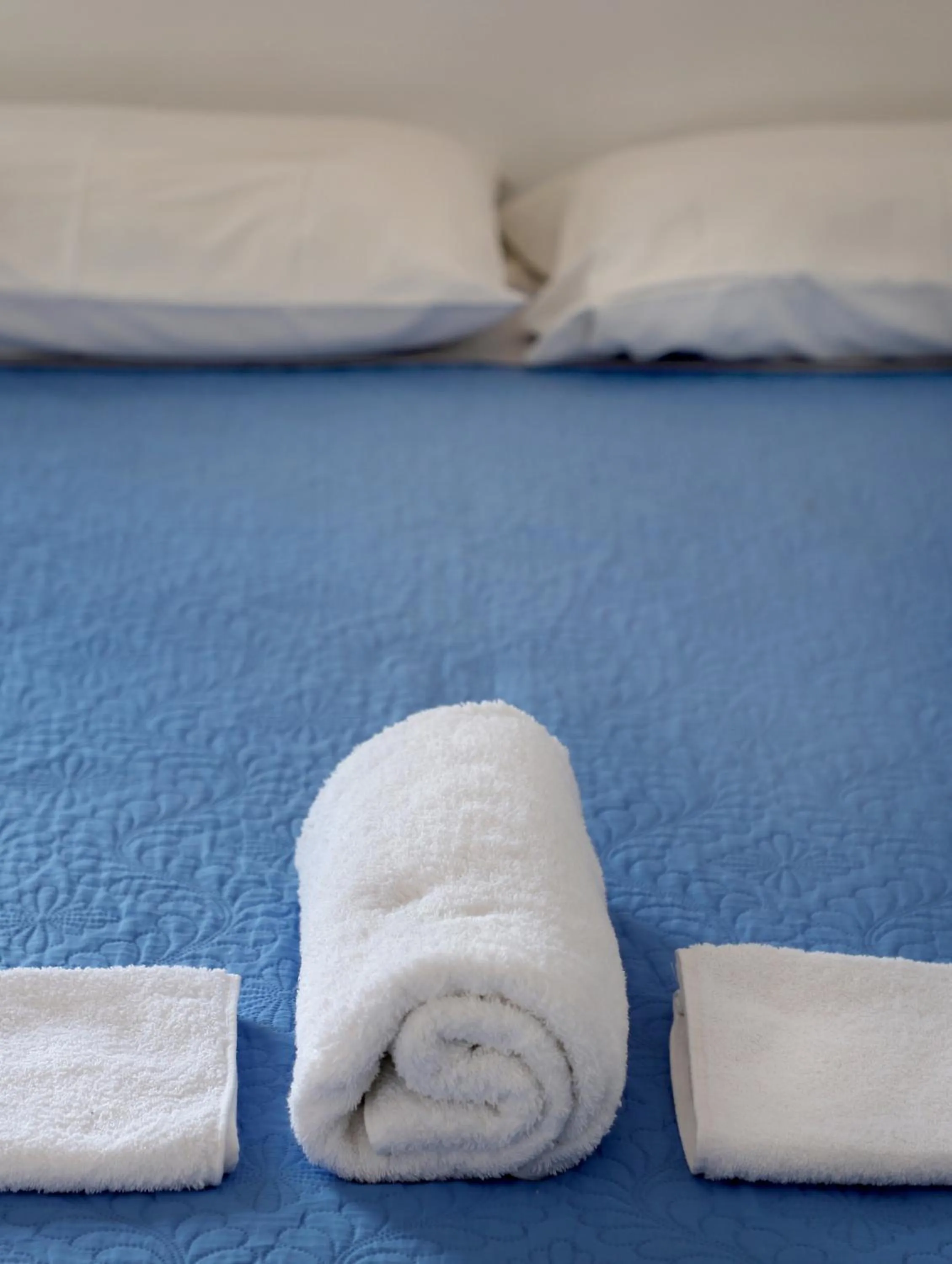 Bed in Helios Studios & Apartments