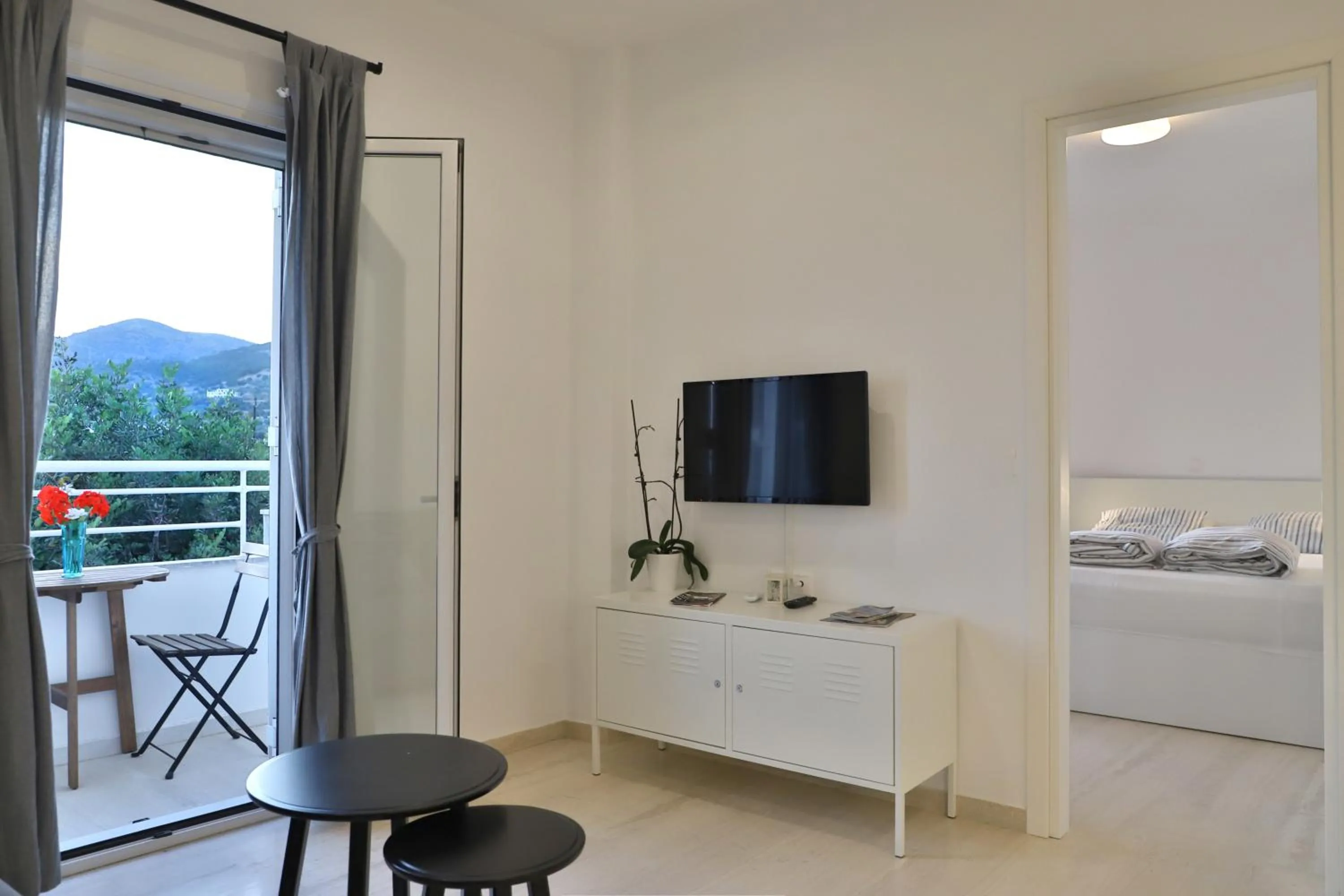 Bed in Helios Studios & Apartments