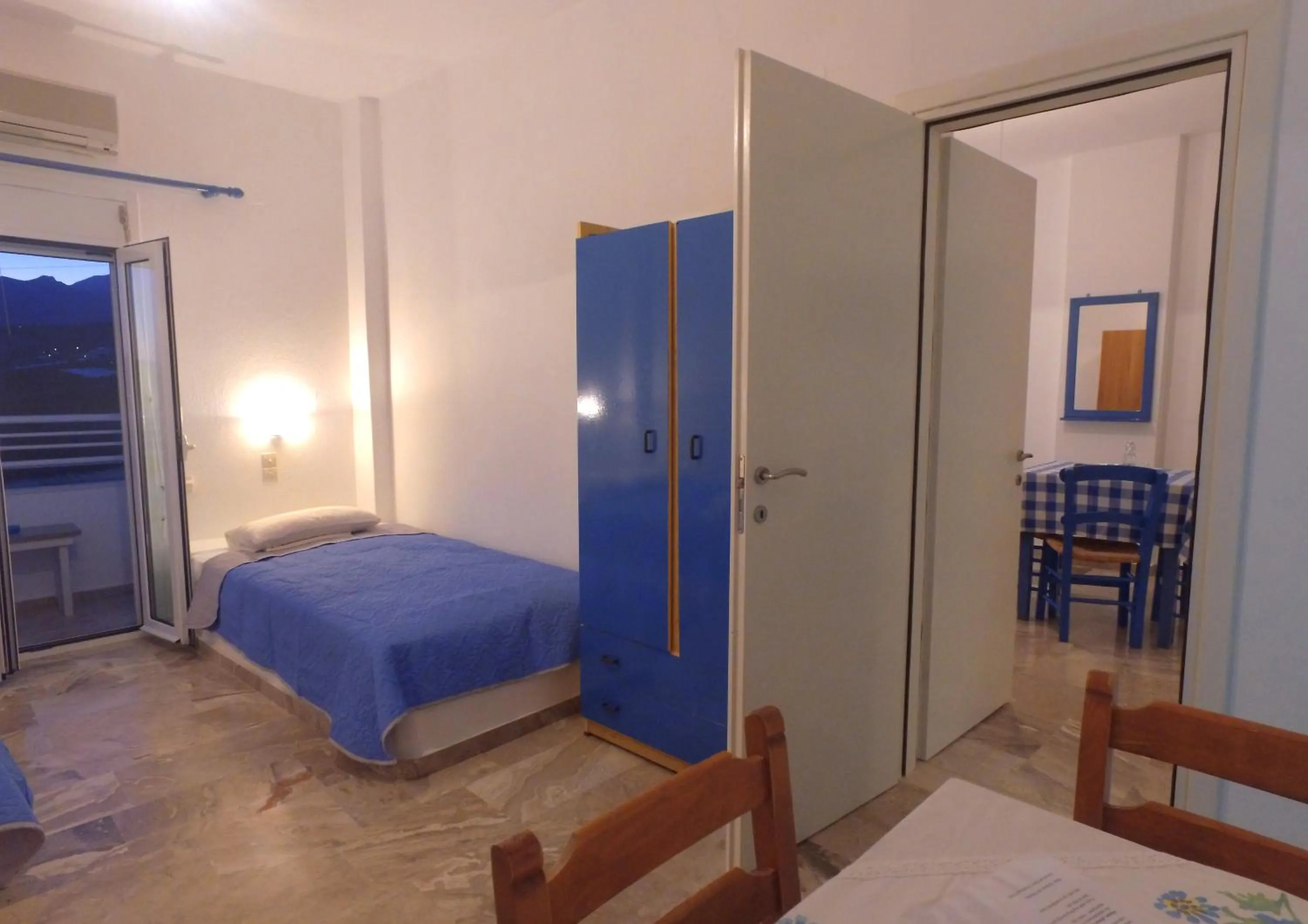 Bed in Helios Studios & Apartments