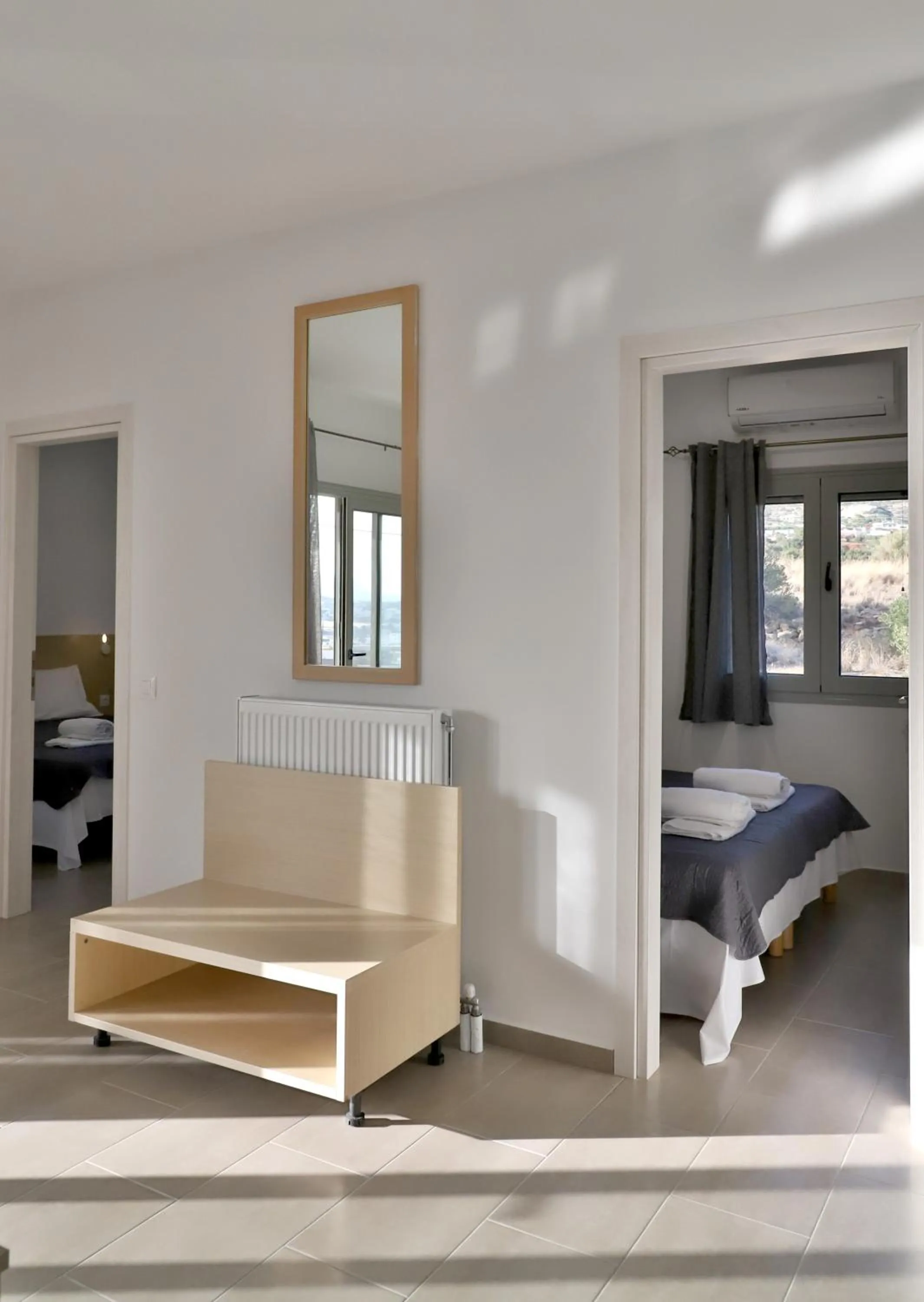 Bed in Helios Studios & Apartments