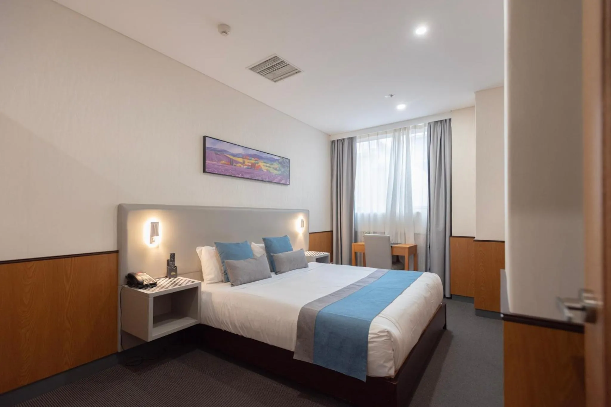 Bed in YEHS Hotel Sydney QVB