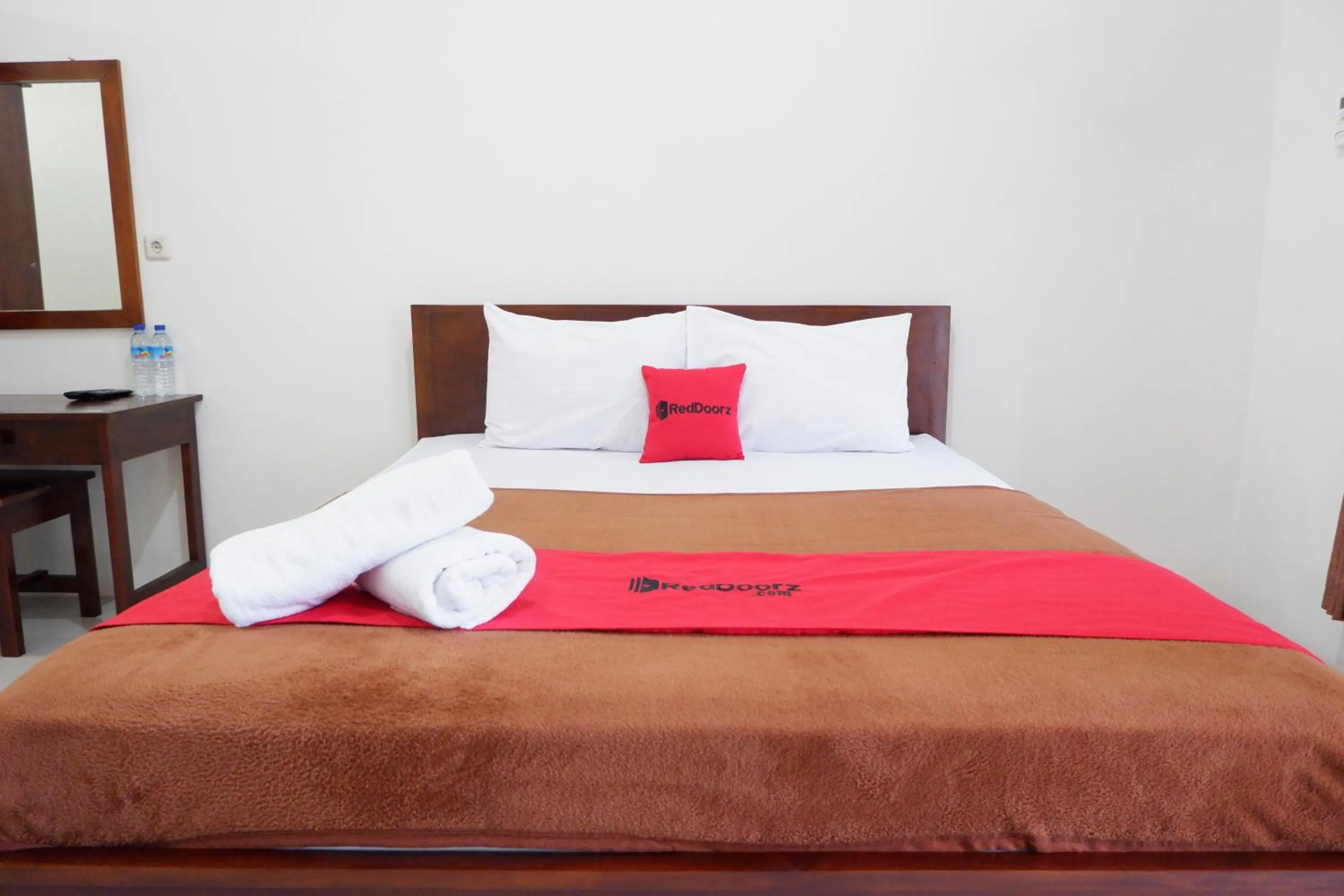 Bed in Reddoorz at Bale Eja Syariah Senggigi