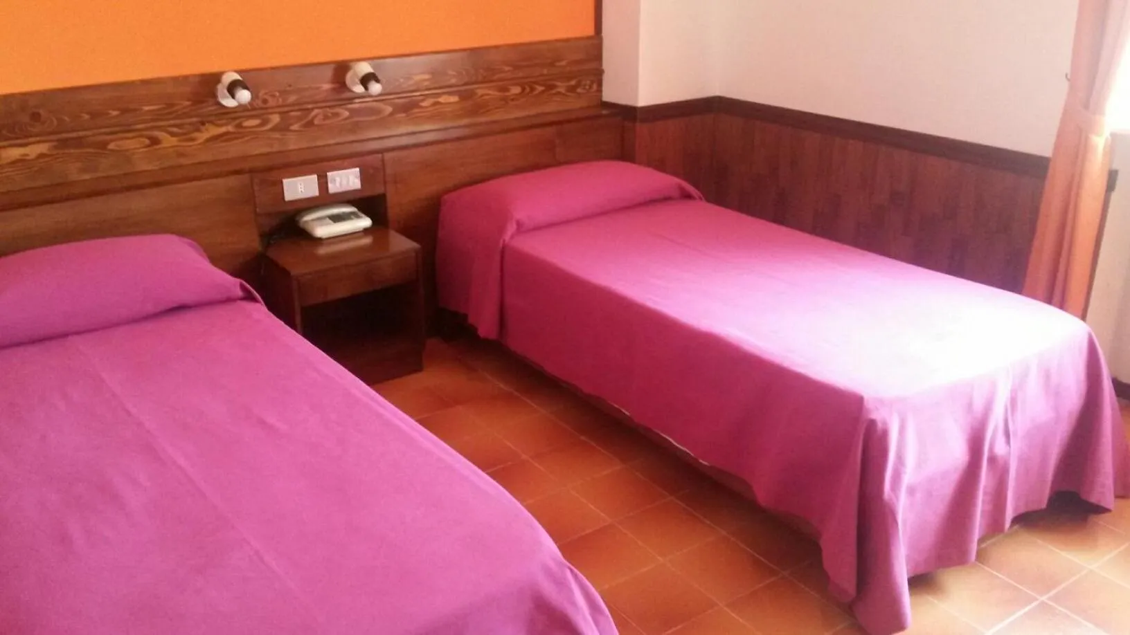 Bed in Hotel Caldora