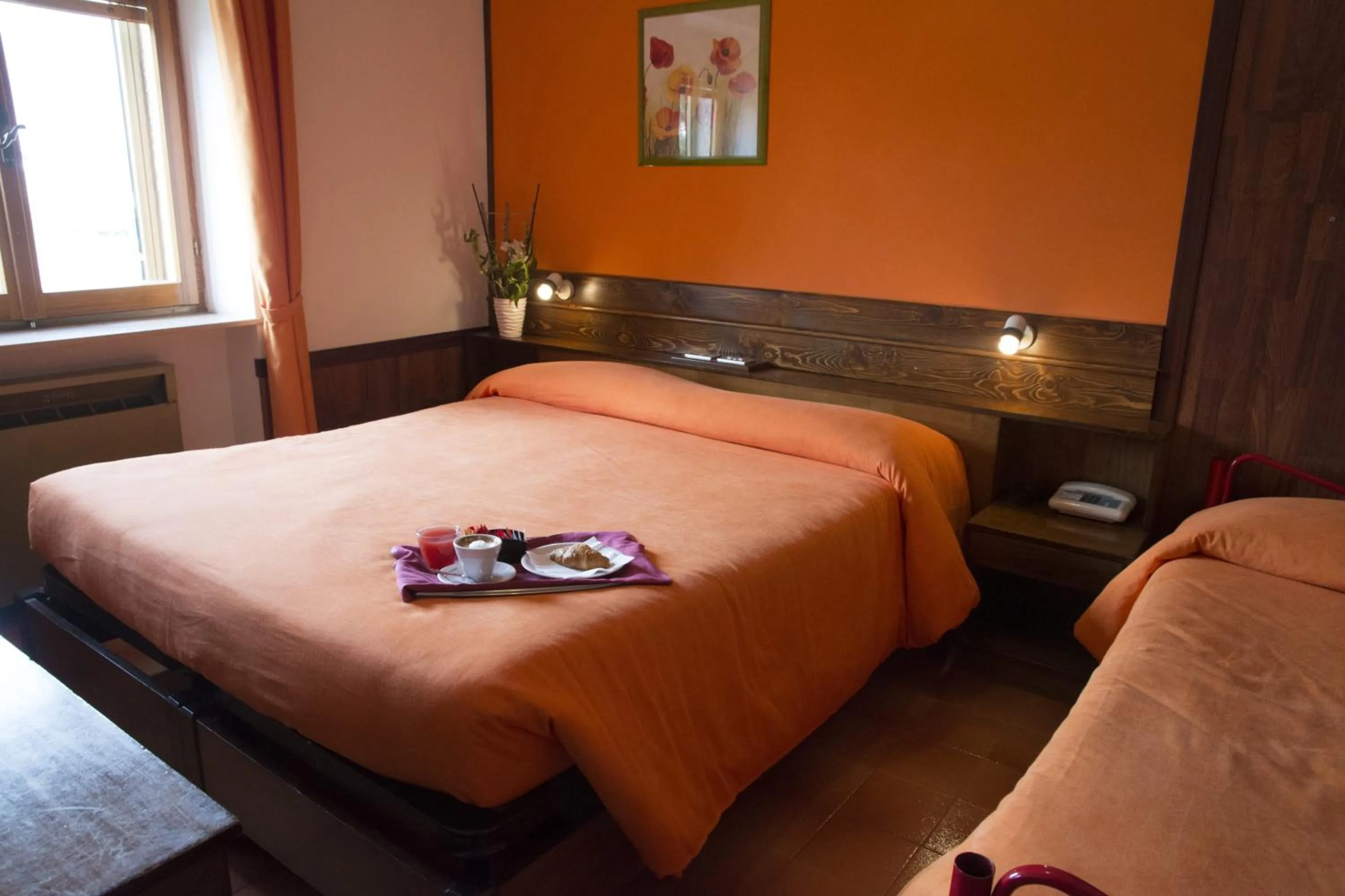 Bed in Hotel Caldora