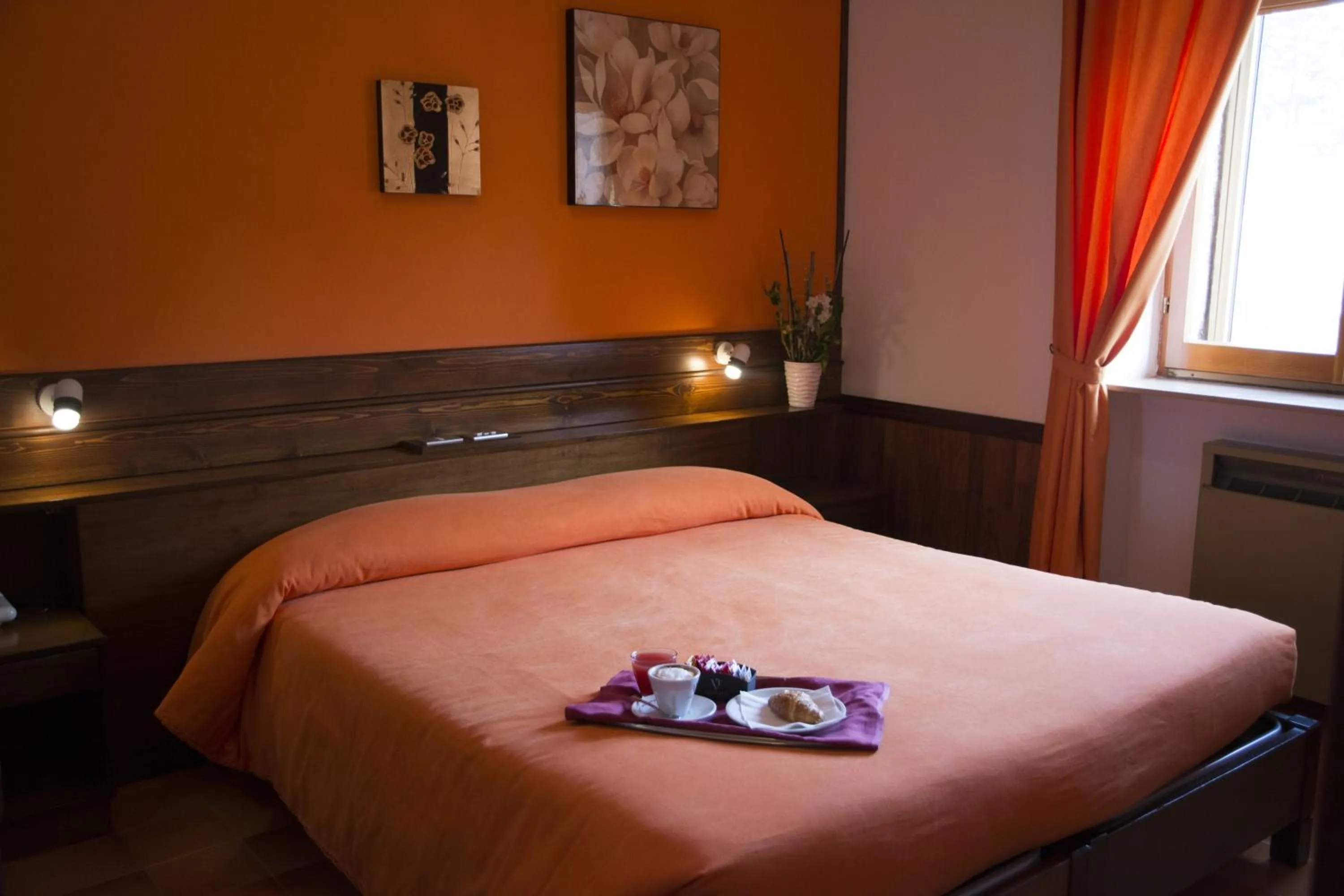 Bed in Hotel Caldora