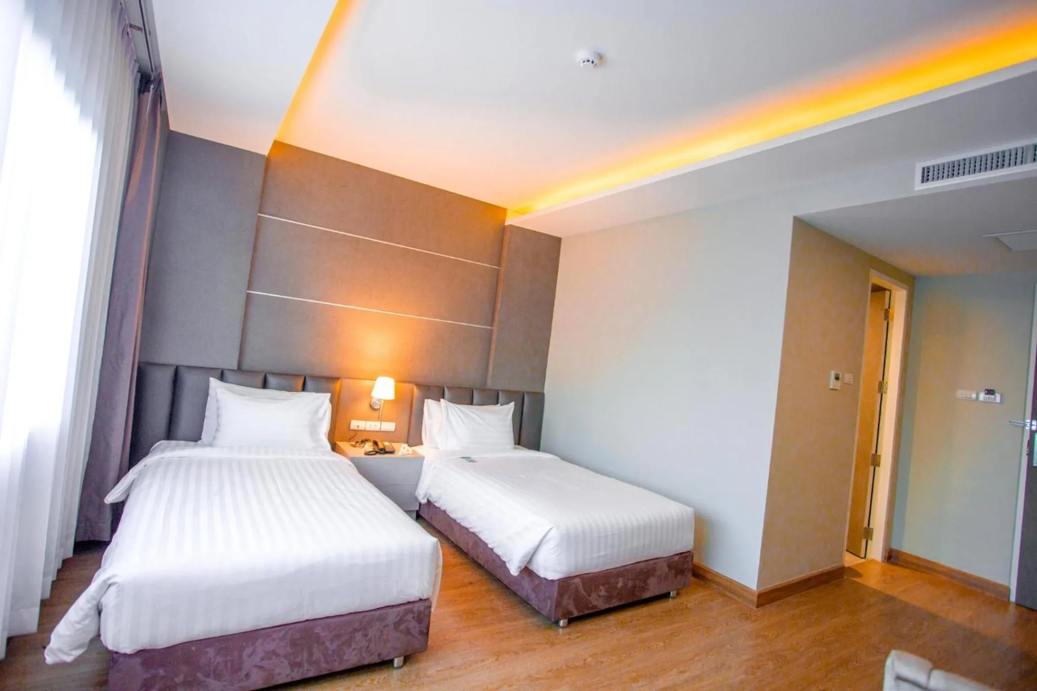 Bed in The Cheewin Hotel And Convention