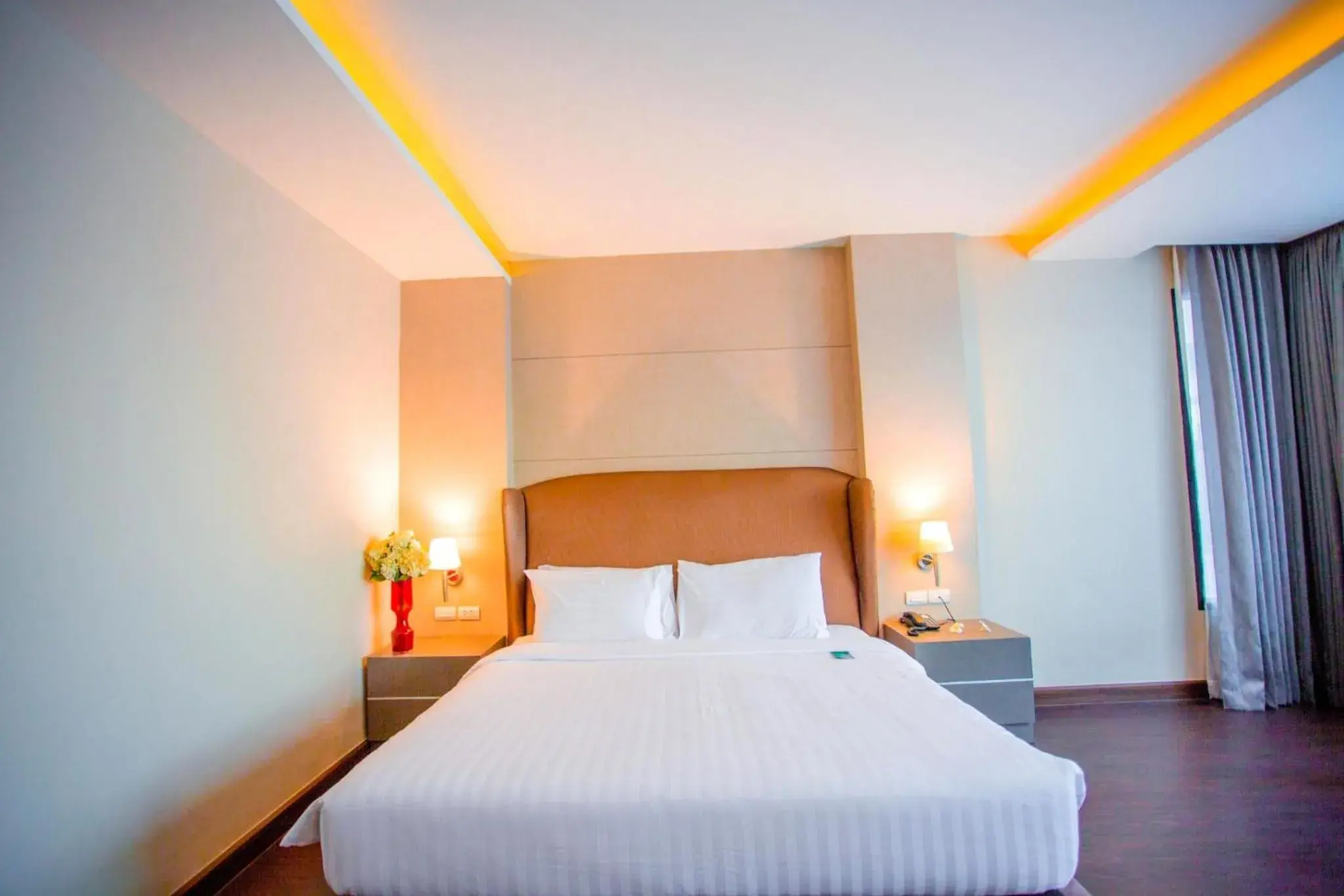 Bed in The Cheewin Hotel And Convention Bed in The Cheewin Hotel And Convention