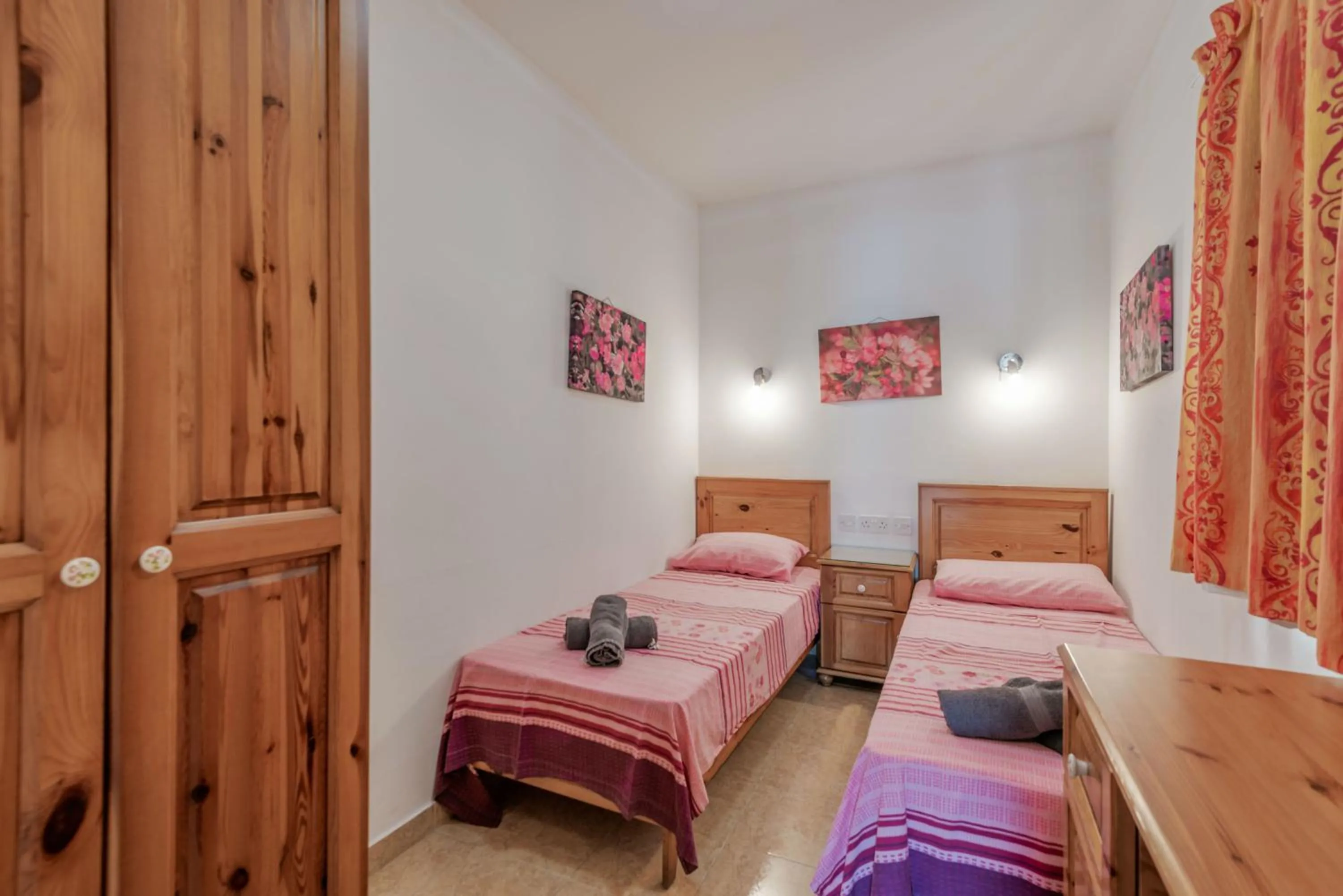 Bedroom, Bed in Harbour Lights seafront 2 bedroom apartments with panoramic sea views - by Getawaysmalta