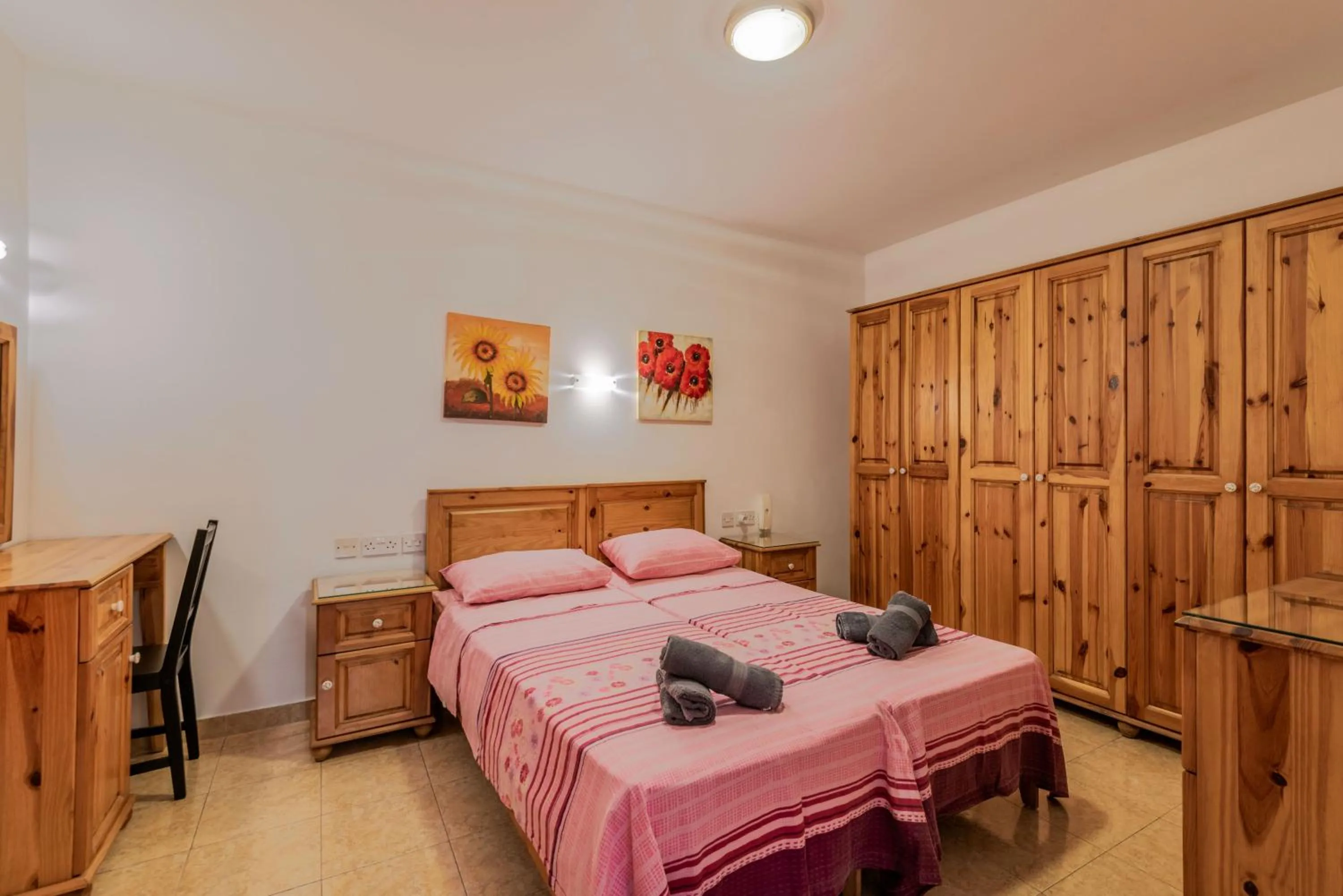 Bedroom, Bed in Harbour Lights seafront 2 bedroom apartments with panoramic sea views - by Getawaysmalta