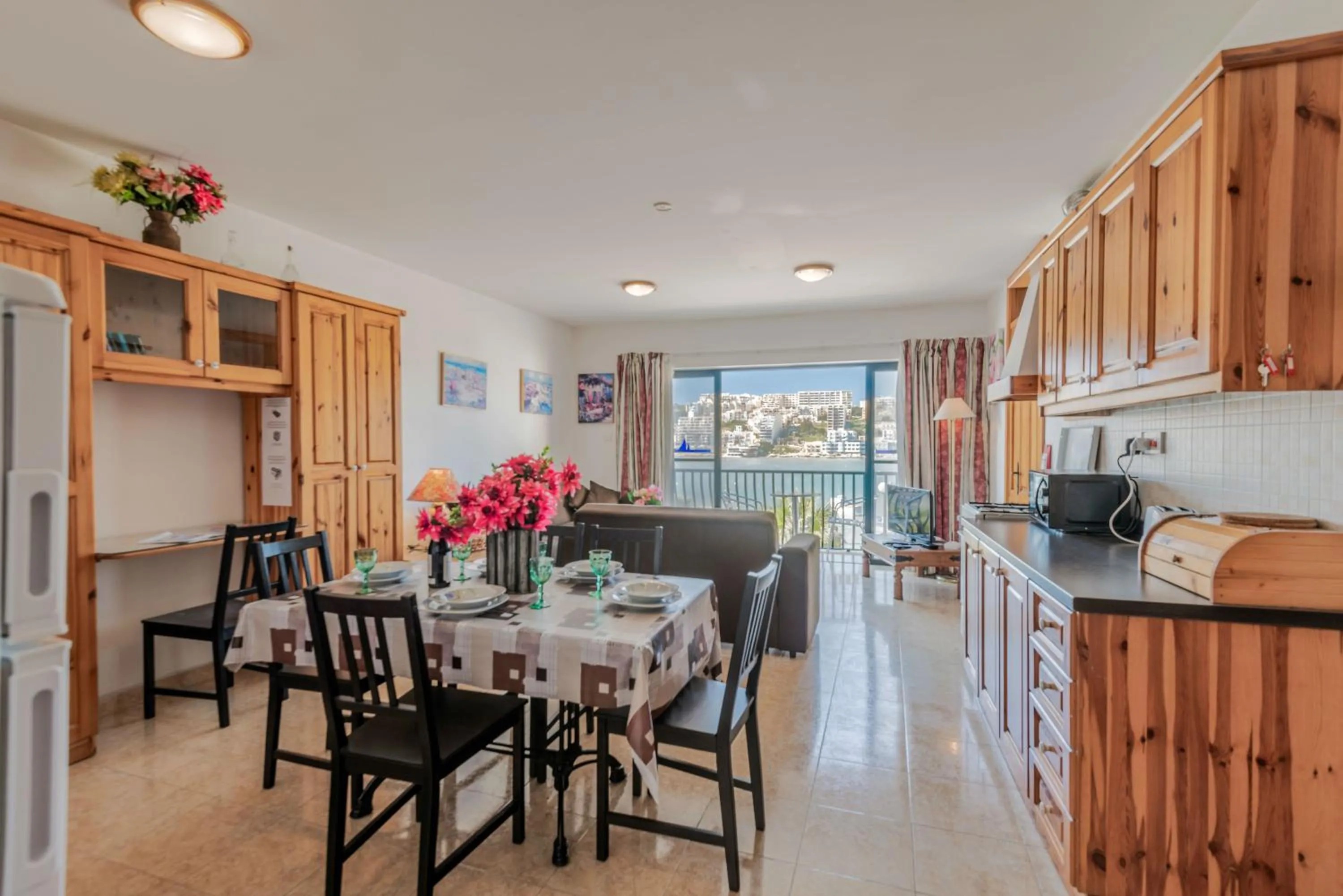 Kitchen or kitchenette in Harbour Lights seafront 2 bedroom apartments with panoramic sea views - by Getawaysmalta
