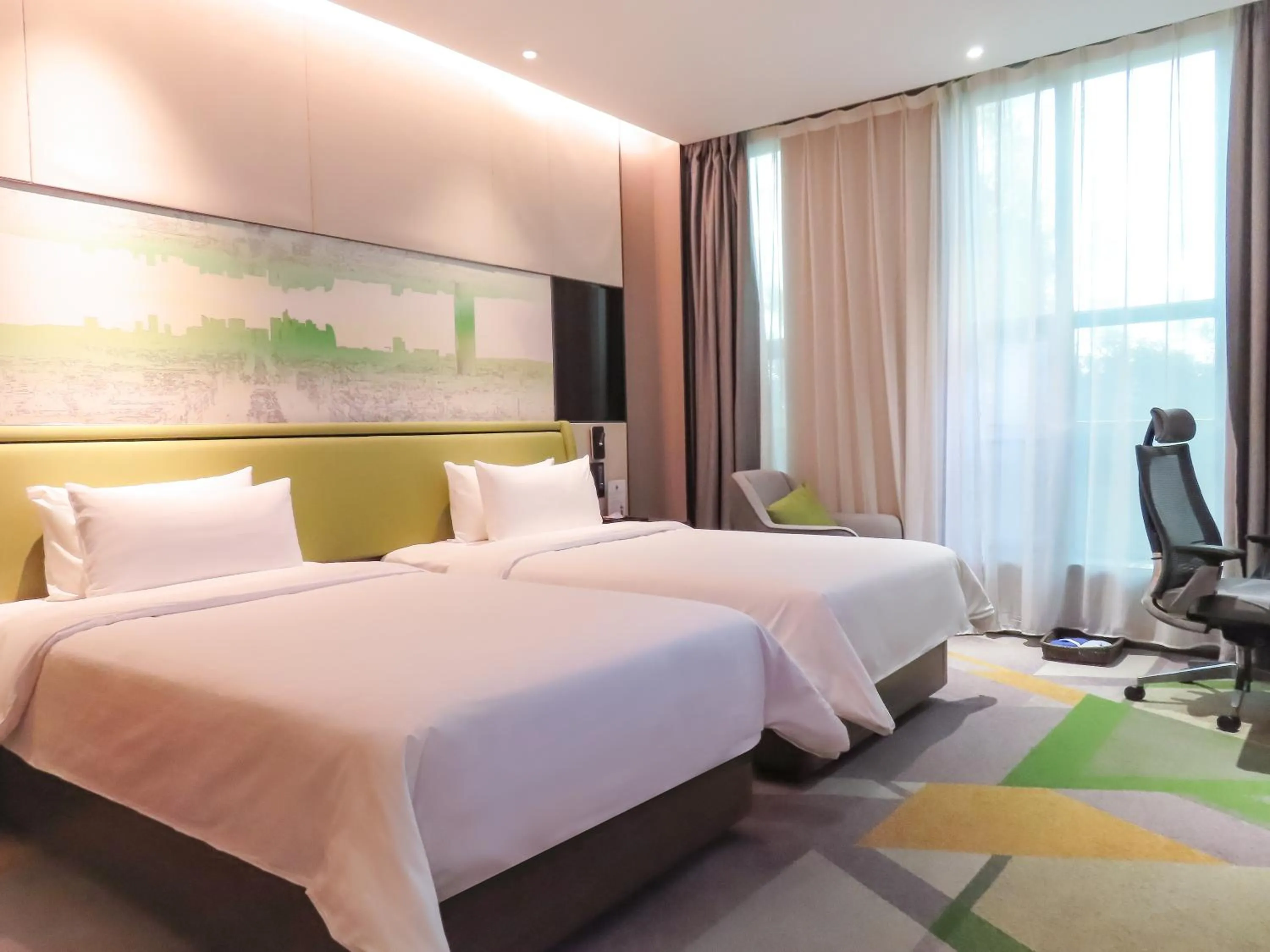 Bed in Hampton by Hilton Guangzhou Tianhe Sports Center