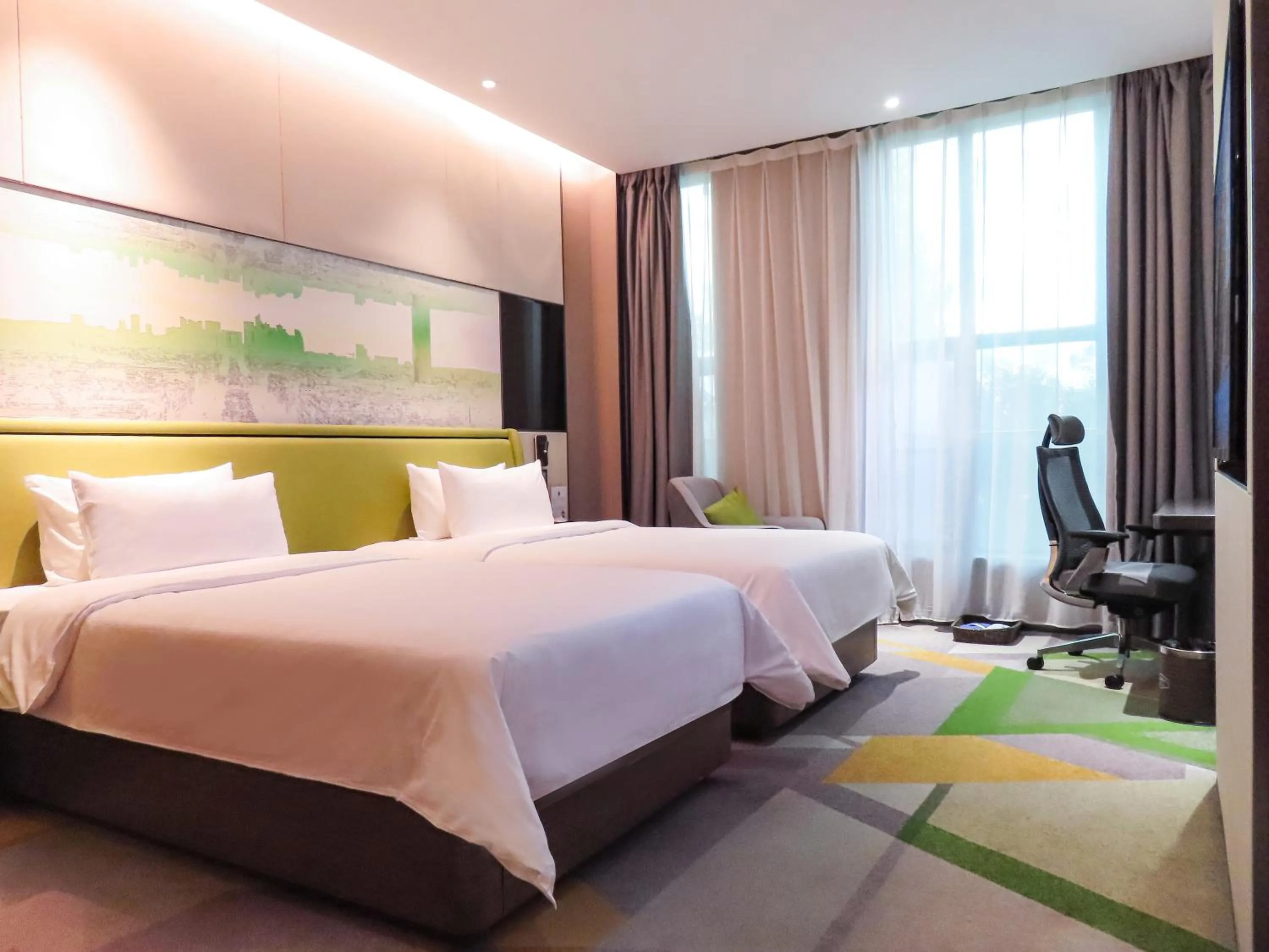 Bed in Hampton by Hilton Guangzhou Tianhe Sports Center