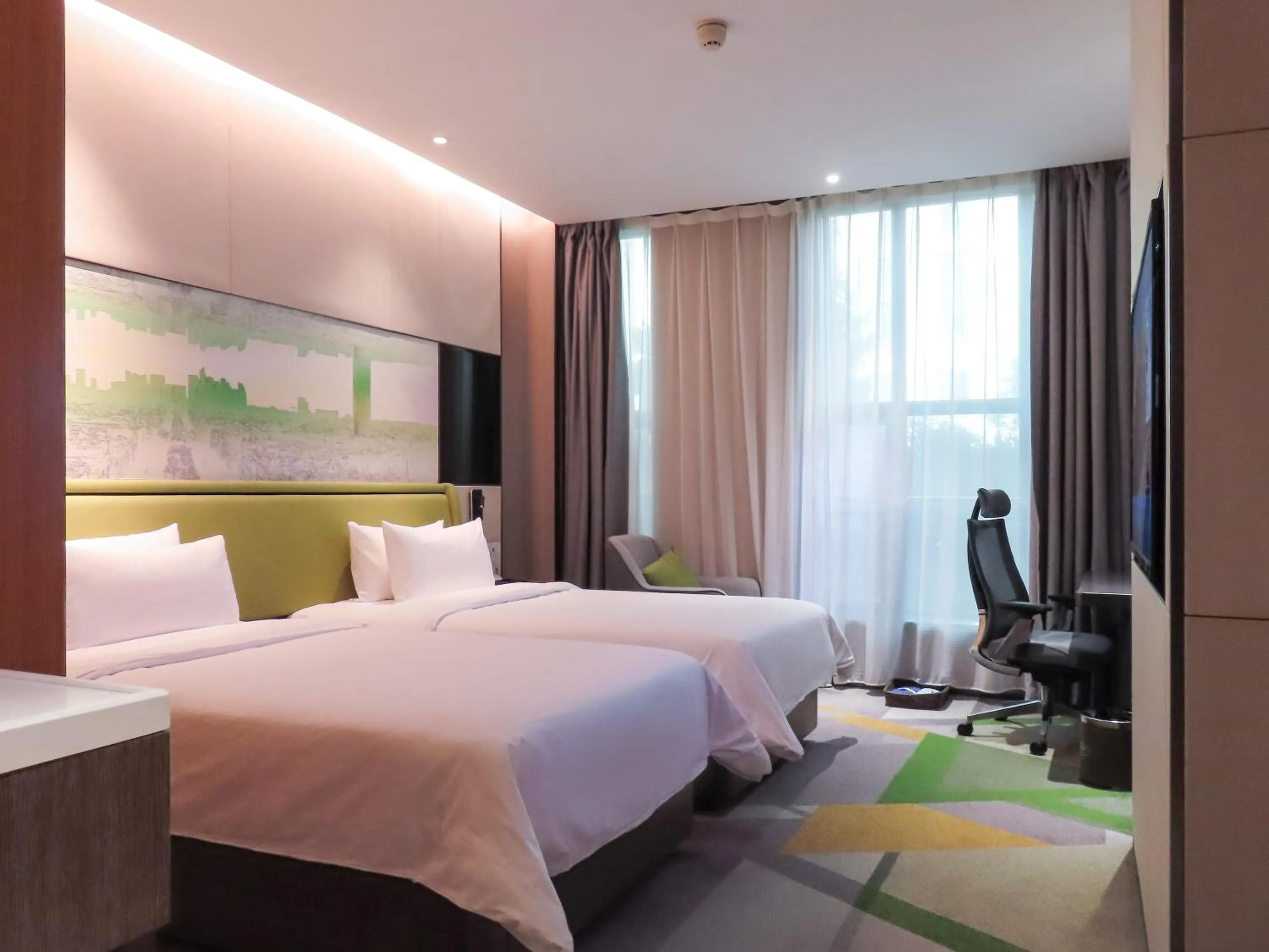 Bed in Hampton by Hilton Guangzhou Tianhe Sports Center